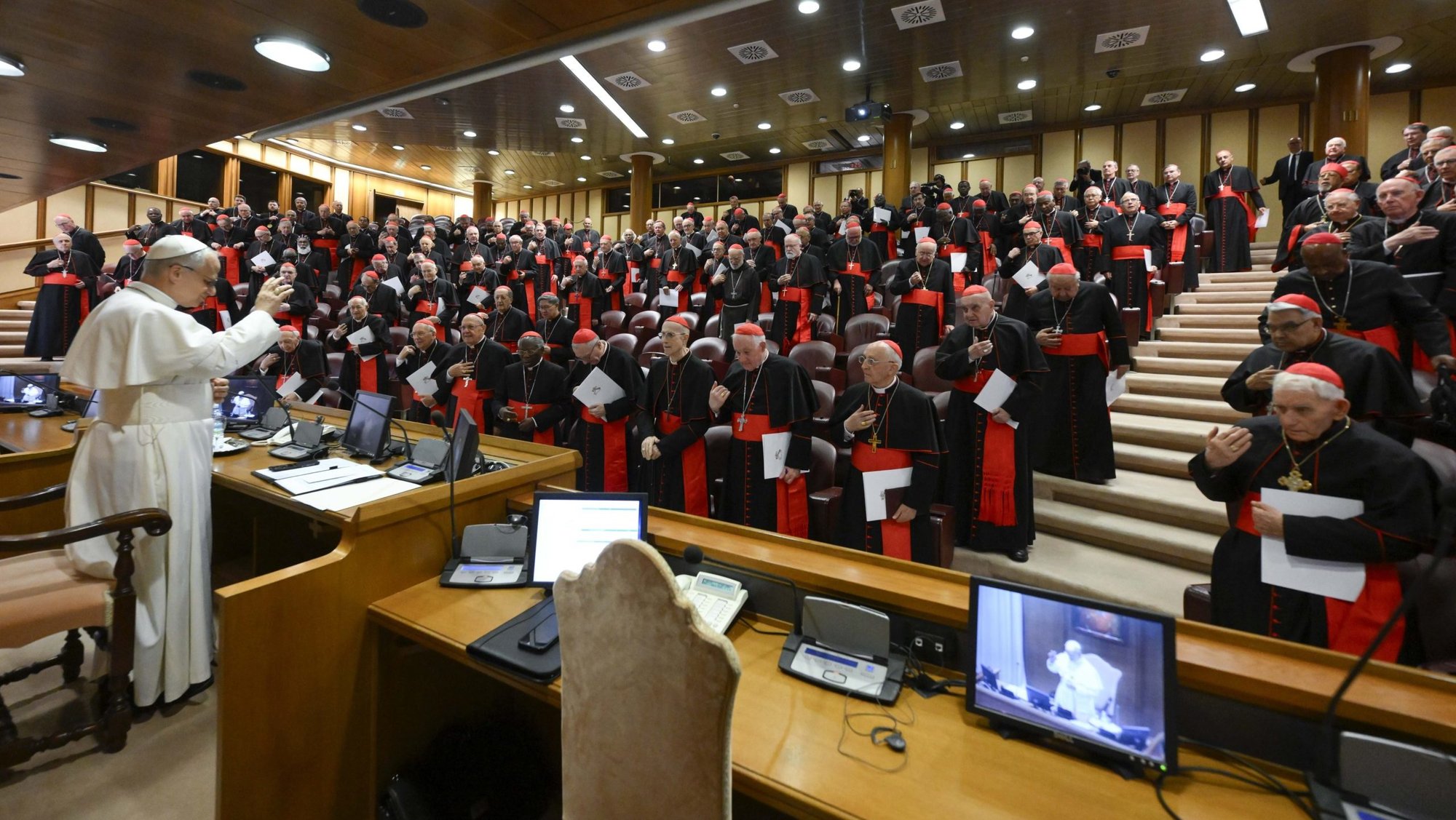 Pope Leo XIV prays with the College of Cardinals in the New Synod Hall at the Vatican May 10, 2025, during his first formal address to the college since his election May 8. (CNS photo/Vatican Media)