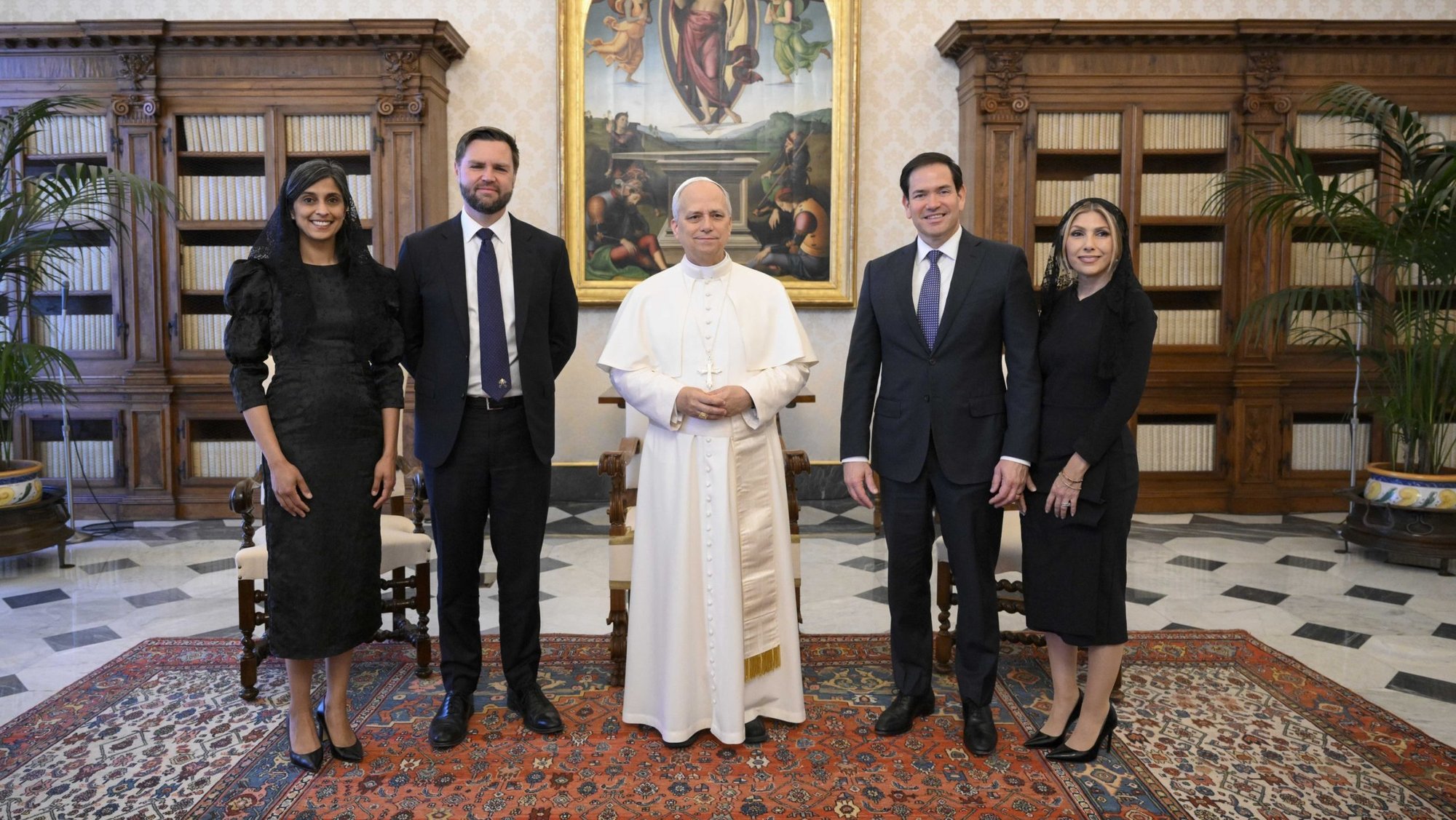 Pope Leo XIV poses for a photograph with U.S. Vice President JD Vance and his wife, Usha Vance, and U.S. Secretary of State Marco Rubio and his wife, Jeanette Dousdebes Rubio, in the library of the Apostolic Palace at the Vatican May 19, 2025. (CNS photo/Vatican Media)