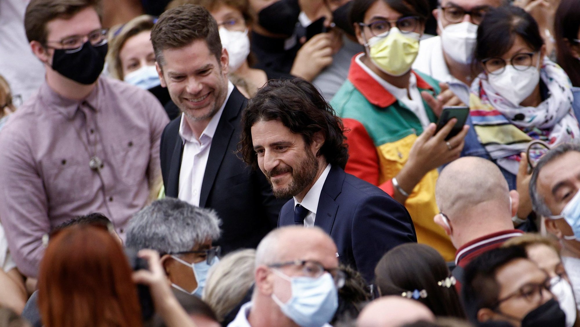 Director Dallas Jenkins and Catholic actor Jonathan Roumie, center with beard, of the series "The Chosen," attend Pope Francis' general audience in the Vatican's Paul VI hall Aug. 11, 2021. (CNS photo/Guglielmo Mangiapane, Reuters)