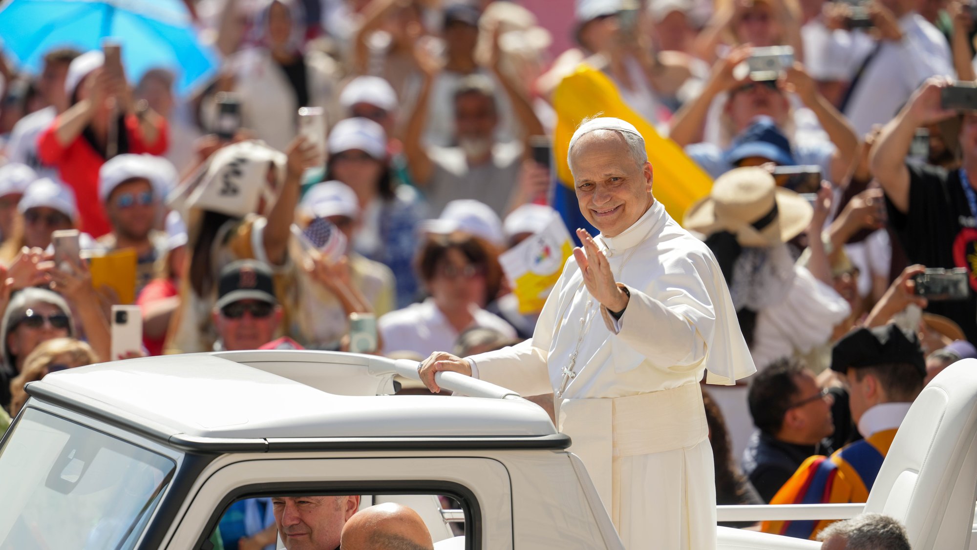 Pope Leo XIV greets visitors and pilgrims from the popemobile as he rides around St. Peter's Square at the Vatican before his weekly general audience June 4, 2025. (CNS photo/Lola Gomez)