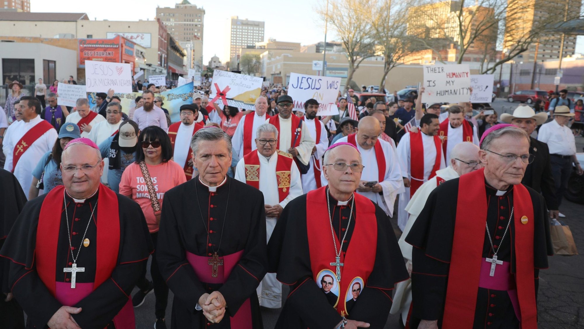 Archbishop John C. Wester of Santa Fe, N.M., (right) takes part in a demonstration in El Paso, Texas, against mass deportation alongside Bishop Peter Baldacchino of Las Cruces, N.M.; Archbishop Gustavo García-Siller of San Antonio and Bishop Mark J. Seitz of El Paso. (OSV News photo/Bob Roller)