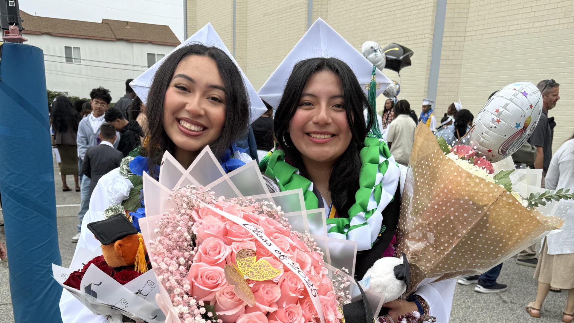 Jedesa Alatorre, left, and Haide Hernandez pose at St. Mary’s Academy’s 2025 commencement ceremony on June 7. (Alatorre Family)