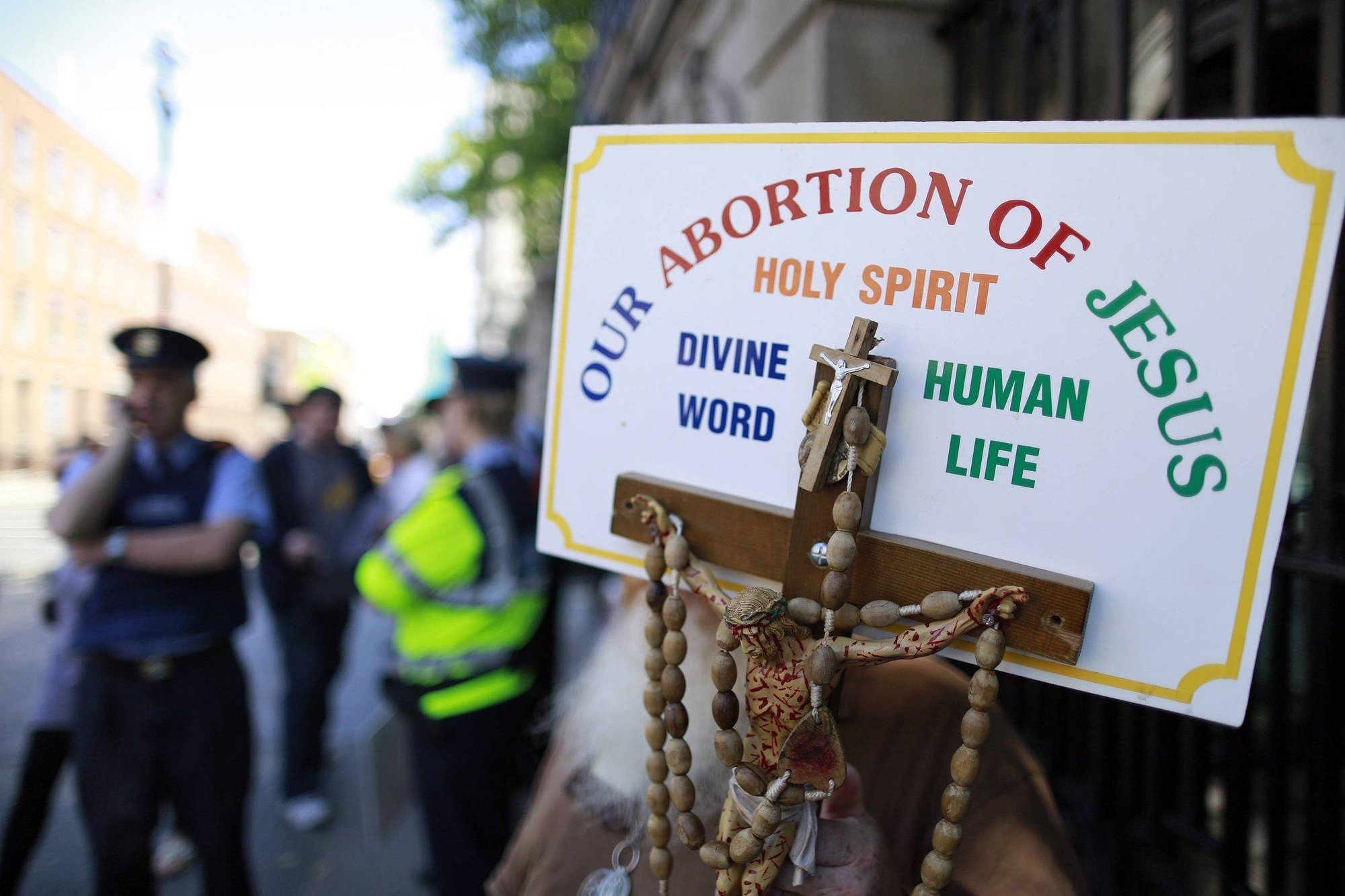 A file photo shows a sign with a crucifix and rosary during a pro-life demonstration outside the Irish Parliament in Dublin. Statistics released by the Department of Health in Ireland showed that abortions in Ireland spiked in the space of just five years. (OSV News/Cathal McNaughton, Reuters)