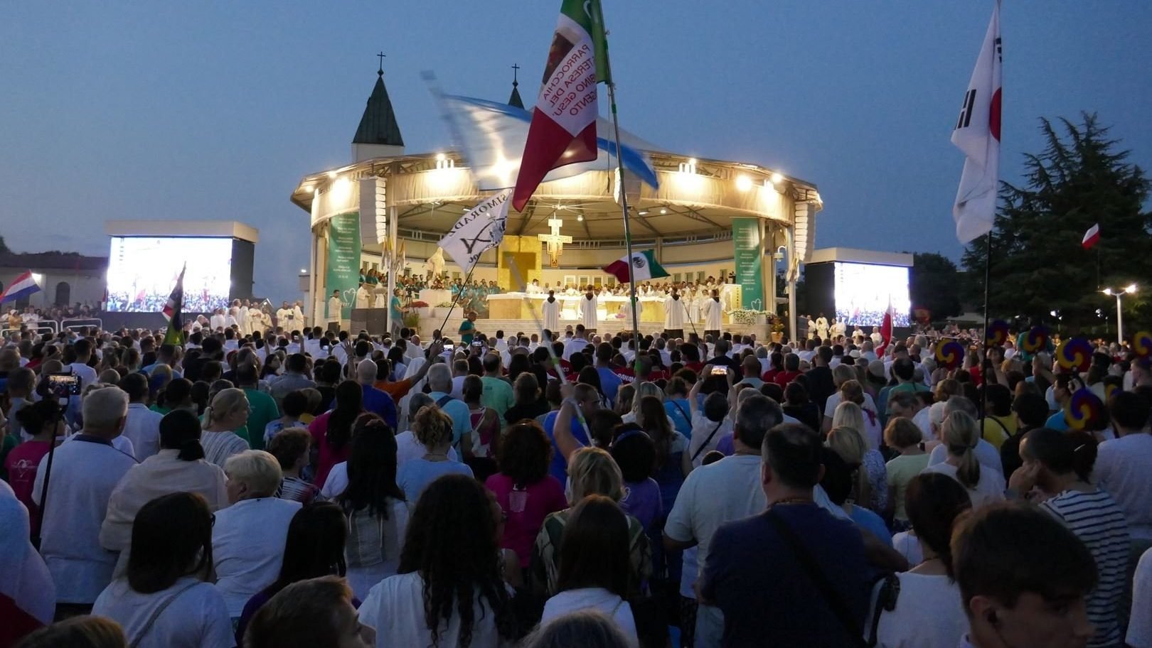 Young people and others gather for prayer behind the Church of St. James in Medjugorje, Bosnia-Herzegovina, in this file photo from the 2024 international youth festival known as Mladifest. Pope Leo XIV sent a message to this year's festival, which is being held Aug. 4-8, 2025. (CNS photo/Courtesy Mladifest)