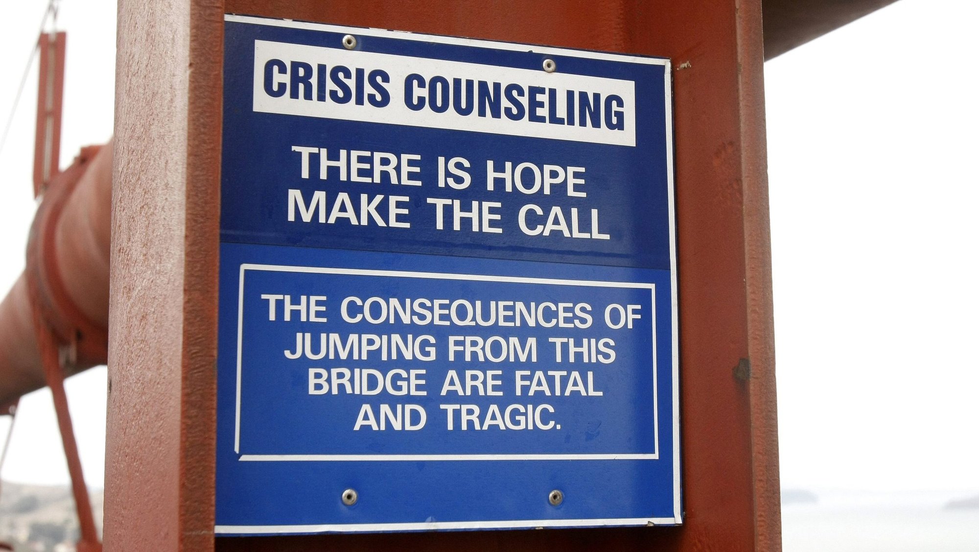 A suicide prevention sign is seen on the Golden Gate Bridge in San Francisco in 2008. National Suicide Prevention Month is observed in September. (OSV News photo/Gregory A. Shemitz)