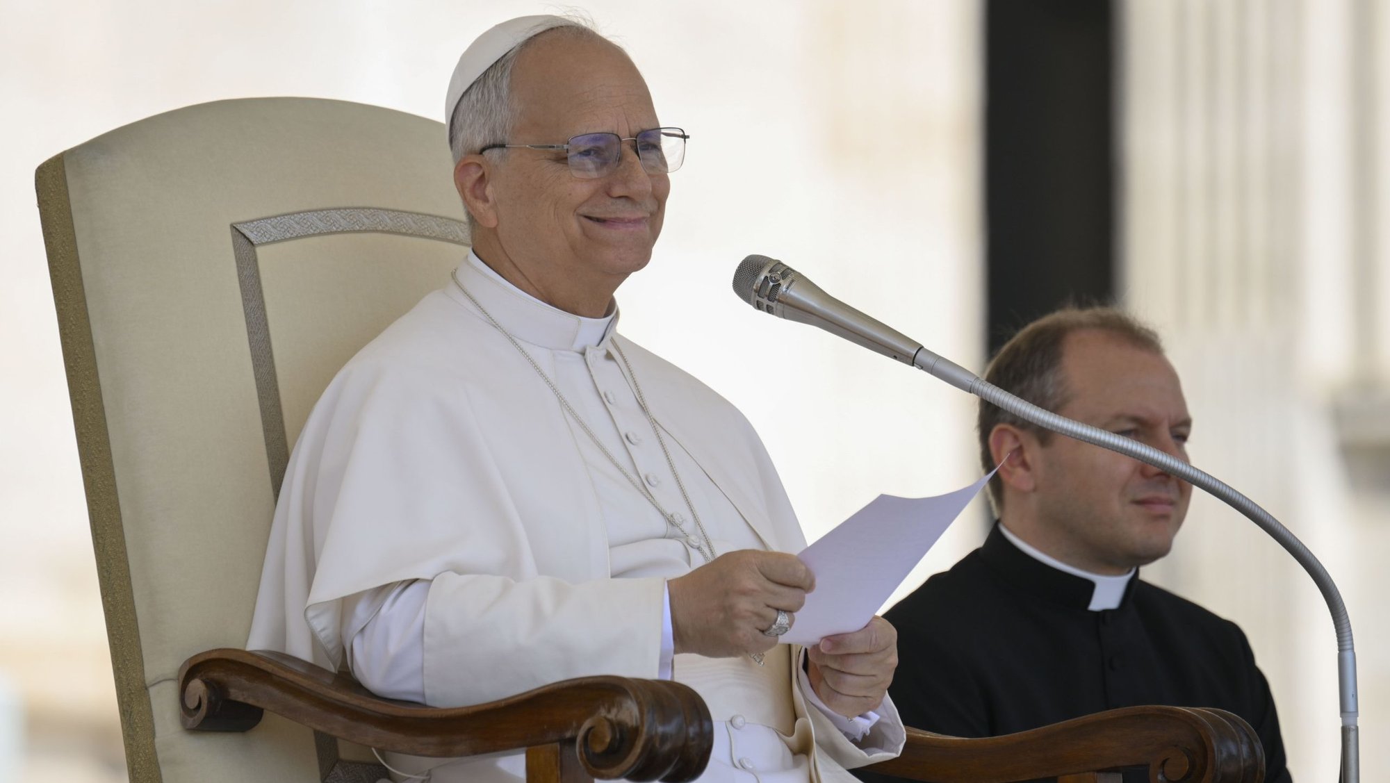 Pope Leo XIV smiles as he greets pilgrims and visitors at his general audience Aug. 6, 2025, in St. Peter's Square at the Vatican. (CNS photo/Vatican Media)