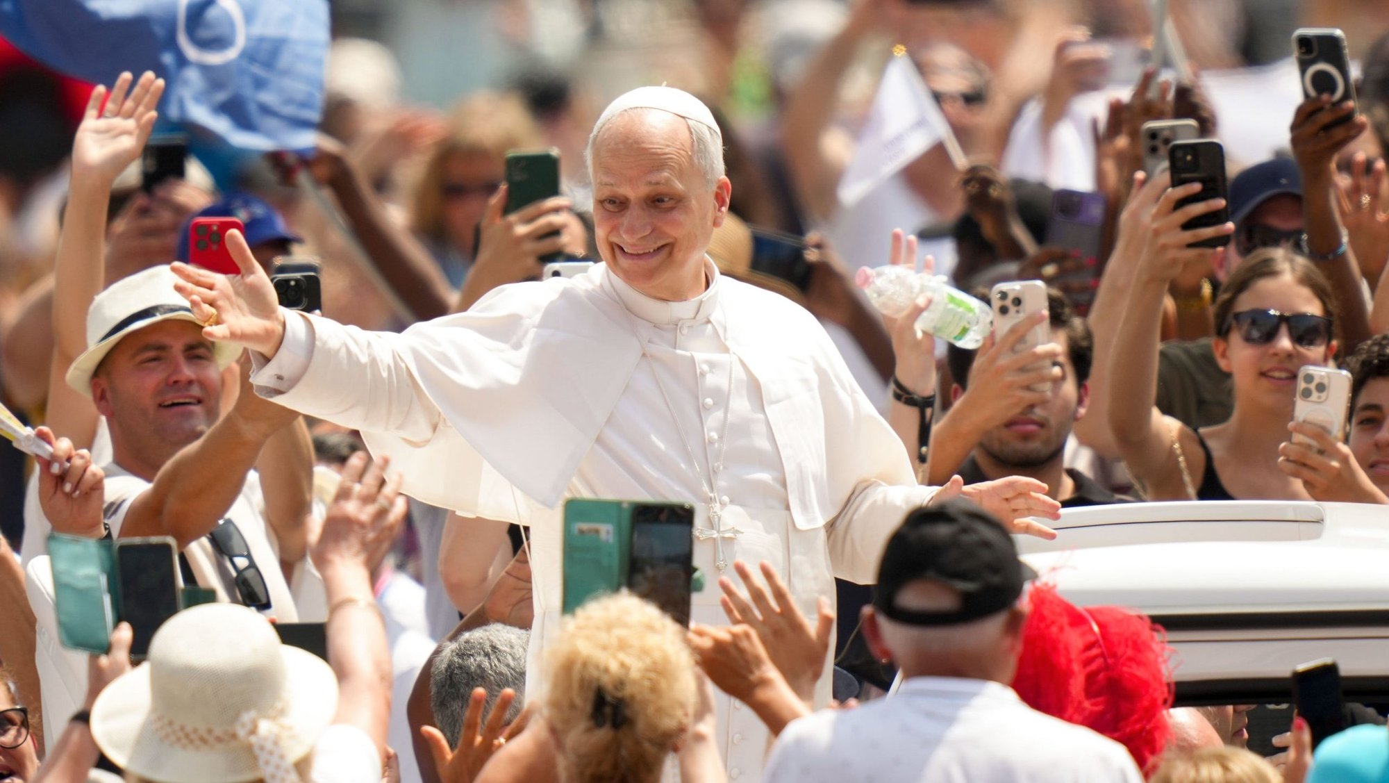 Pope Leo XIV greets people as he rides in the popemobile in St. Peter’s Square after celebrating Mass for the conclusion of the Jubilee of Sport in St. Peter’s Basilica at the Vatican June 15, 2025. (CNS photo/Lola Gomez)