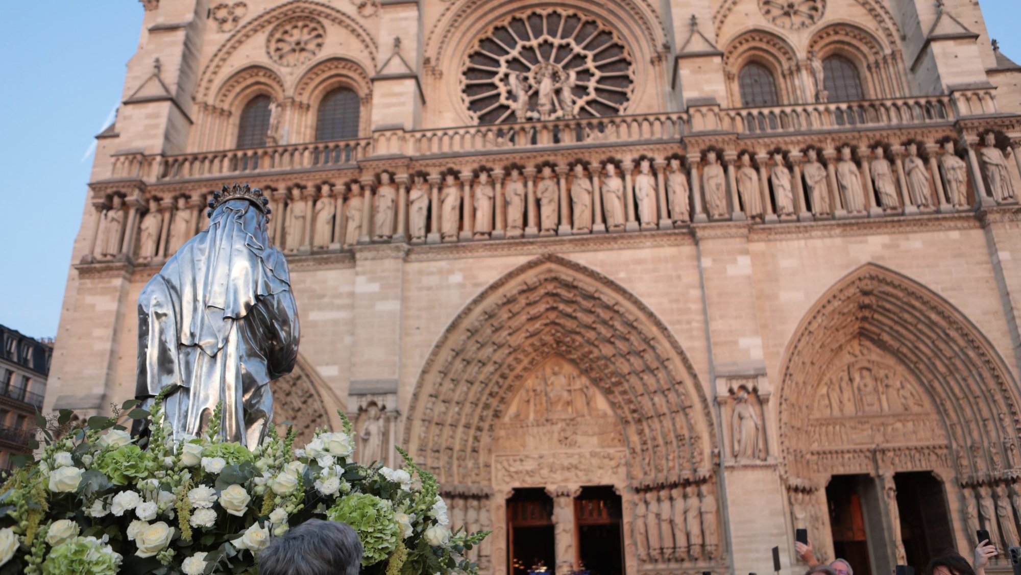 A 19th-century silver statue of Mary is carried in front of Notre Dame Cathedral in Paris on Aug. 14, 2025. For the first time since its reopening in December 2024, the cathedral marked the feast of the Assumption with a solemn outdoor procession on Aug. 15. As many as 3,400 faithful filled the streets of the Ile de la Cité, honoring the Virgin Mary in a tradition interrupted for five years by the cathedral's post-fire restoration. (OSV News photo/courtesy Antoine Muller)