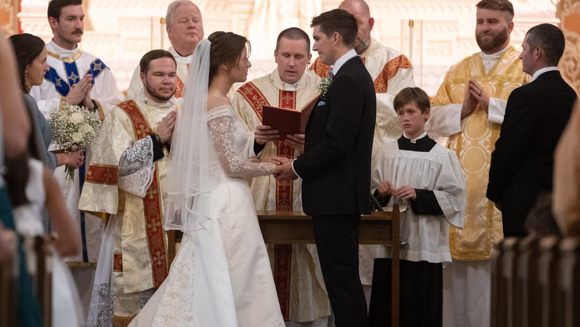 A couple exchange wedding vows at St. Mary Church in Chatfield, Minn., Sept. 14, 2024. The California Catholic Conference announced Aug. 20, 2025, it has entered a historic agreement with Communio aimed at strengthening Catholic marriage, family life throughout the state. Communio, based in Virginia, is a national marriage ministry that works with both Catholic and Protestant churches. (OSV News photo/Dave Hrbacek, The Catholic Spirit)