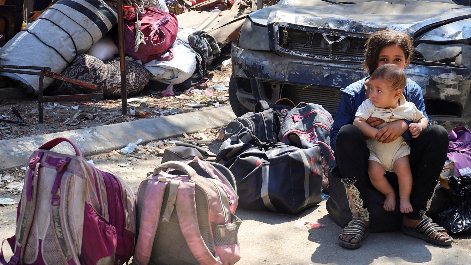 Displaced Palestinian children sit near their belongings during an Israeli military operation in Gaza City, Aug. 26, 2025. (OSV News photo/Ebrahim Hajjaj, Reuters)