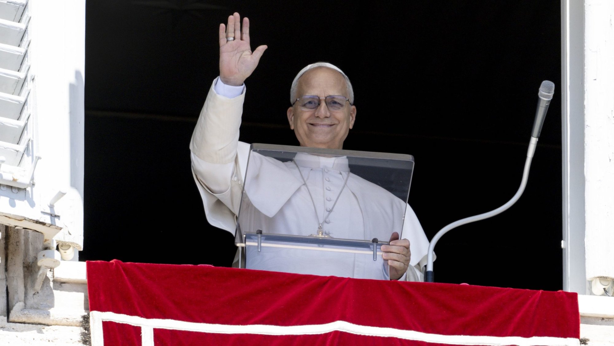 Pope Leo XIV waves to visitors and pilgrims in St. Peter's Square at the Vatican Aug. 31, 2025, before leading the recitation of the Angelus prayer. (CNS photo/Vatican Media)
