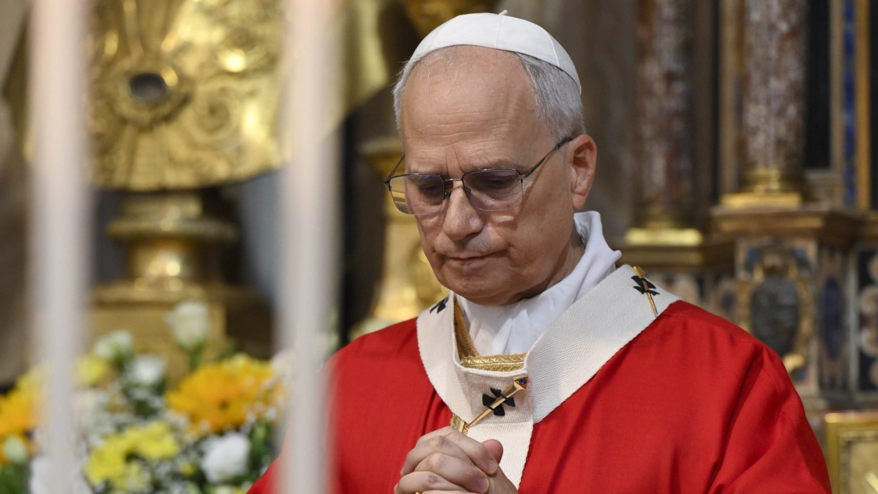 Pope Leo XIV prays as he presides over a Mass opening the general chapter of the Augustinian order Sept. 1, 2025, in the Basilica of St. Augustine in Rome. (CNS photo/Vatican Media)