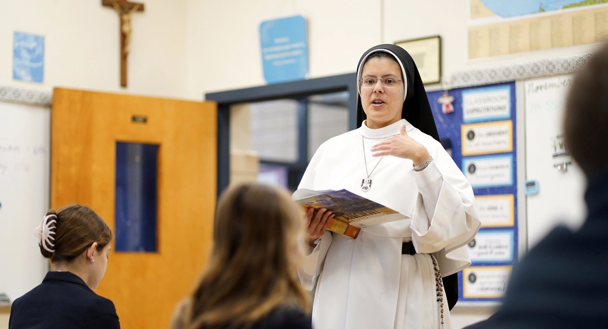 Sister Agnes Maria, a member of the Dominican Sisters of Mary, Mother of the Eucharist, is seen teaching a seventh-grade class on ancient civilization at St. Mary's Middle School in Manhasset, N.Y., Nov. 15, 2023. (OSV News photo/Gregory A. Shemitz)