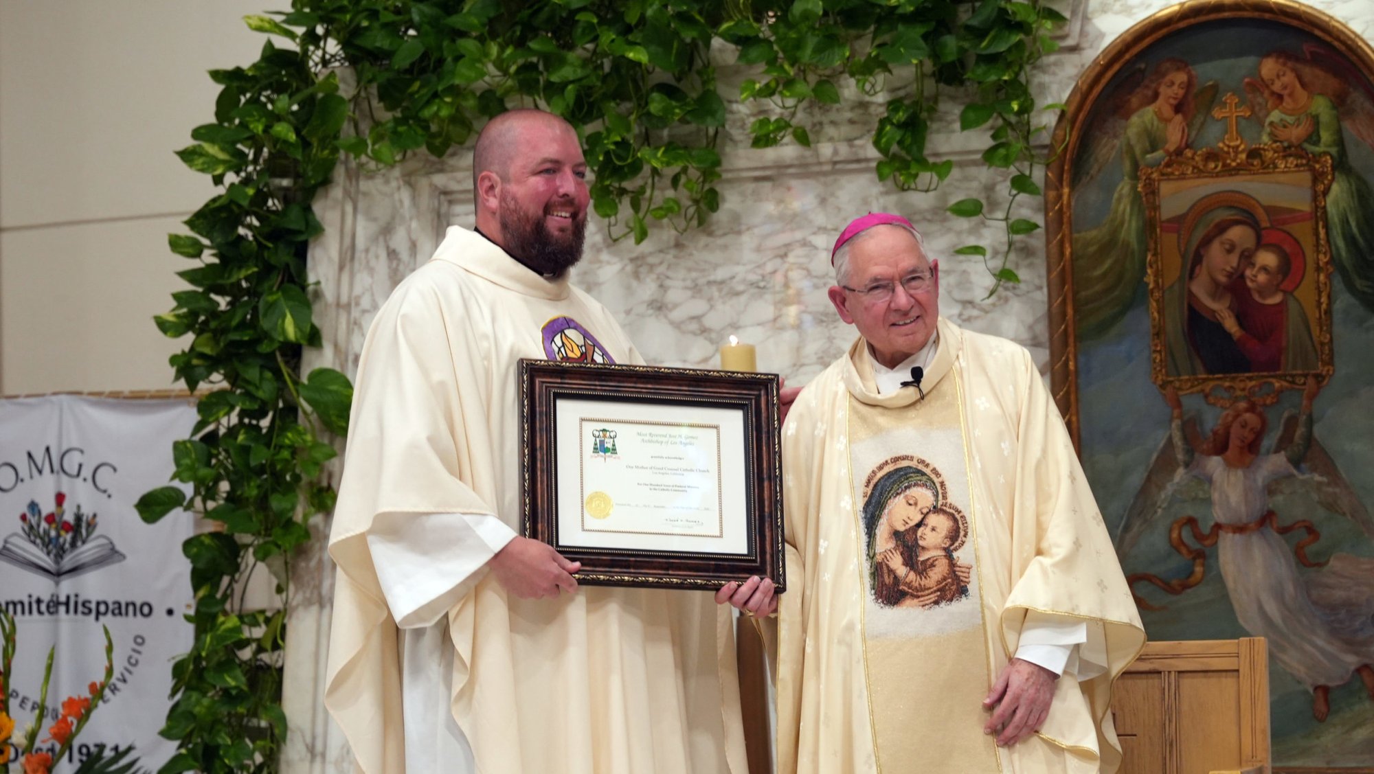Archbishop José H. Gomez poses with Our Mother of Good Counsel Church pastor, Father Max Villeneuve, OSA, during a special Mass celebrating the Los Feliz parish's 100th anniversary on Sept. 6. (Bernard Ejada)