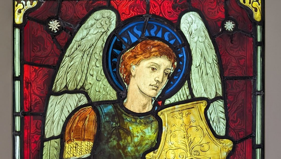 St. Michael stained glass, by Harry Ellis Wooldridge, 1845-1917, made by James Powell & Sons, 1876. From St. Michael and All Angels’ Church, Weybridge, Surrey, England. (Wikimedia Commons)