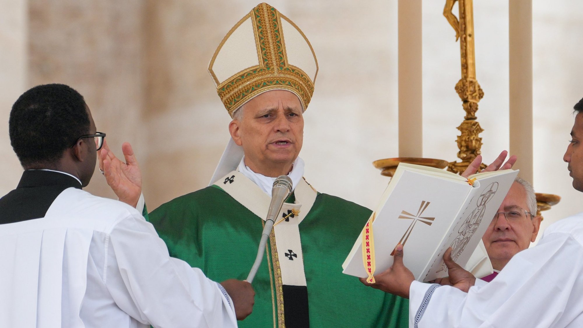 Pope Leo XIV gives his blessing at the conclusion of Mass for the Jubilee of Migrants and the Jubilee of the Missions in St. Peter’s Square at the Vatican Oct. 5, 2025. (CNS photo/Lola Gomez)