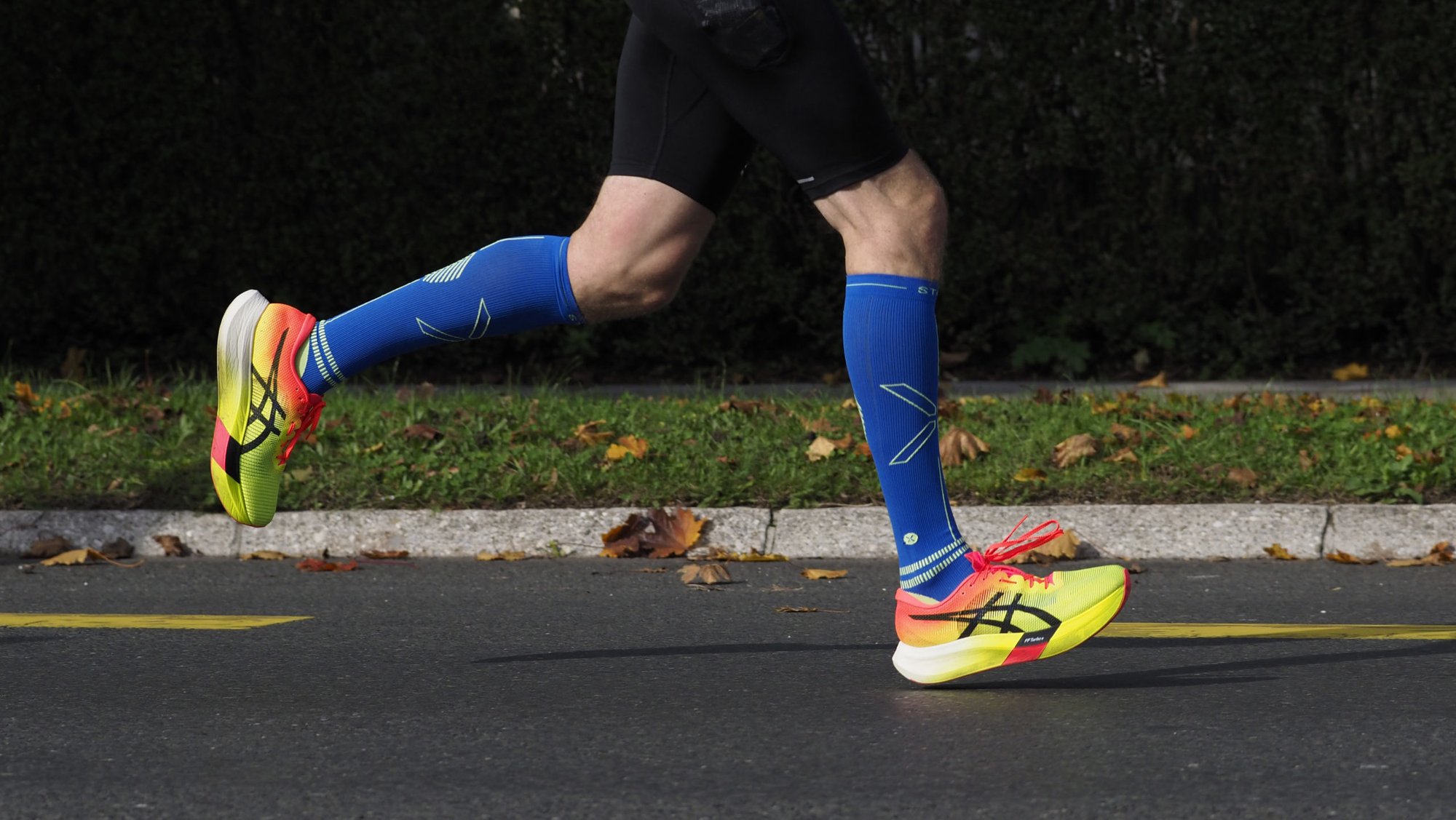 Marathon runner in part of his running gait wearing Asics Metaspeed Edge "Paris" (2024 Ljubljana Marathon)