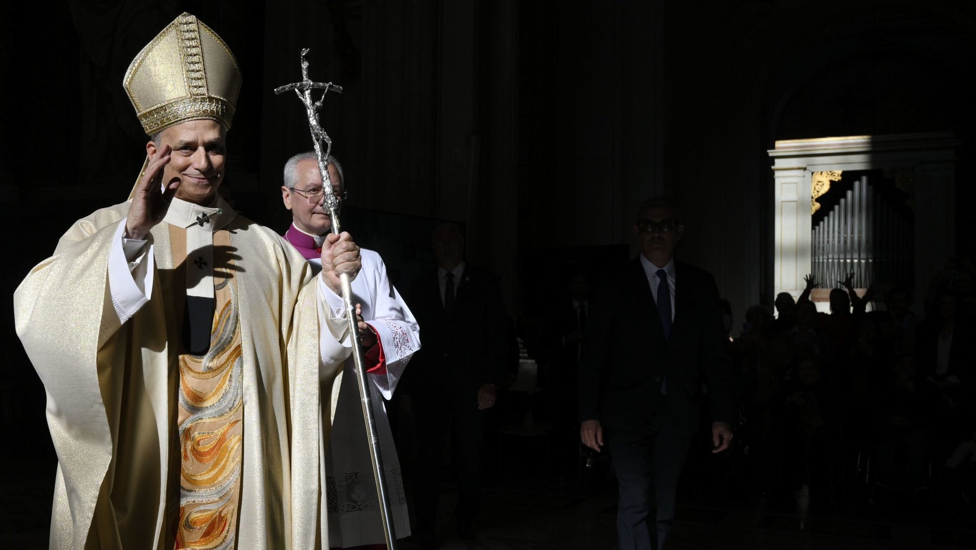Pope Leo XIV gives his blessing as he processes out after celebrating Mass at Rome's Basilica of St. John Lateran Nov. 9, 2025. (CNS photo/Vatican Media)