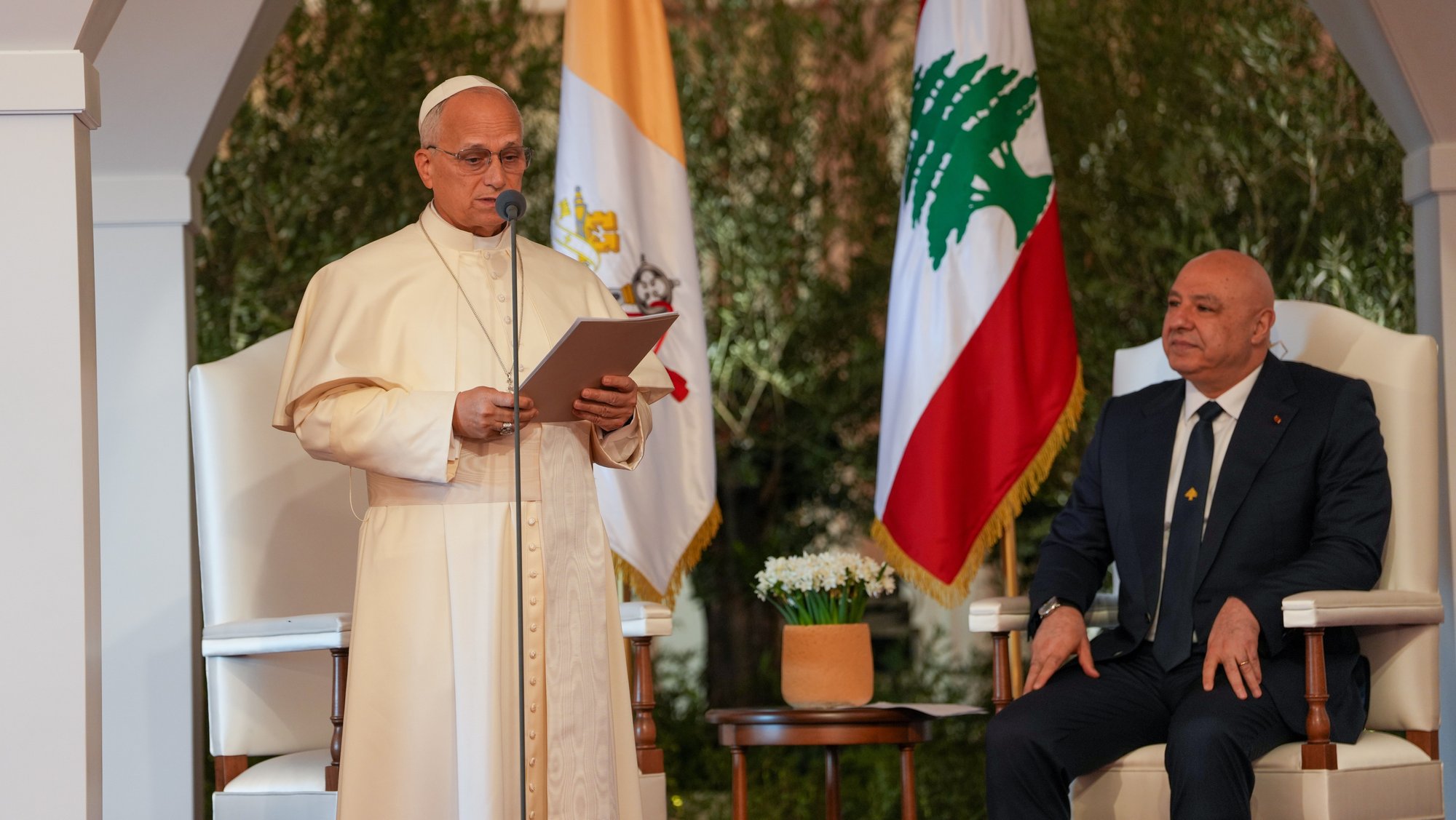 Pope Leo XIV gives his farewell address on the final day of his first apostolic journey at the international airport in Beirut, Lebanon, Dec. 2, 2025. Looking on is Lebanese President Joseph Aoun. (CNS photo/Lola Gomez)