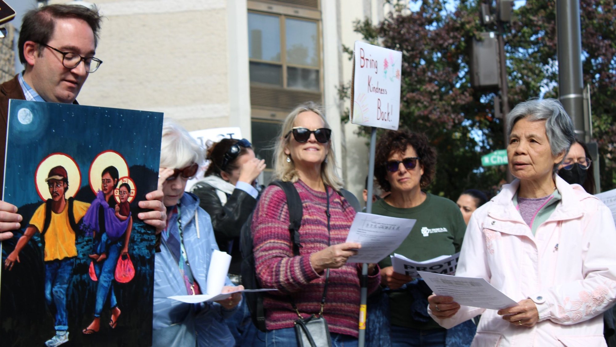 Participants gathered Oct. 22, 2025, in front of the U.S. Immigration and Customs Enforcement offices in Philadelphia as part of the nation-wide "One Church, One Family" prayer vigils organized by the Jesuits West province and several Catholic organizations, including the U.S. Conference of Catholic Bishops' Migration and Refugee Services, to protest mass deportations and promote pastoral accompaniment for immigrants lacking permanent legal status in the U.S. (OSV News photo/Gina Christian)