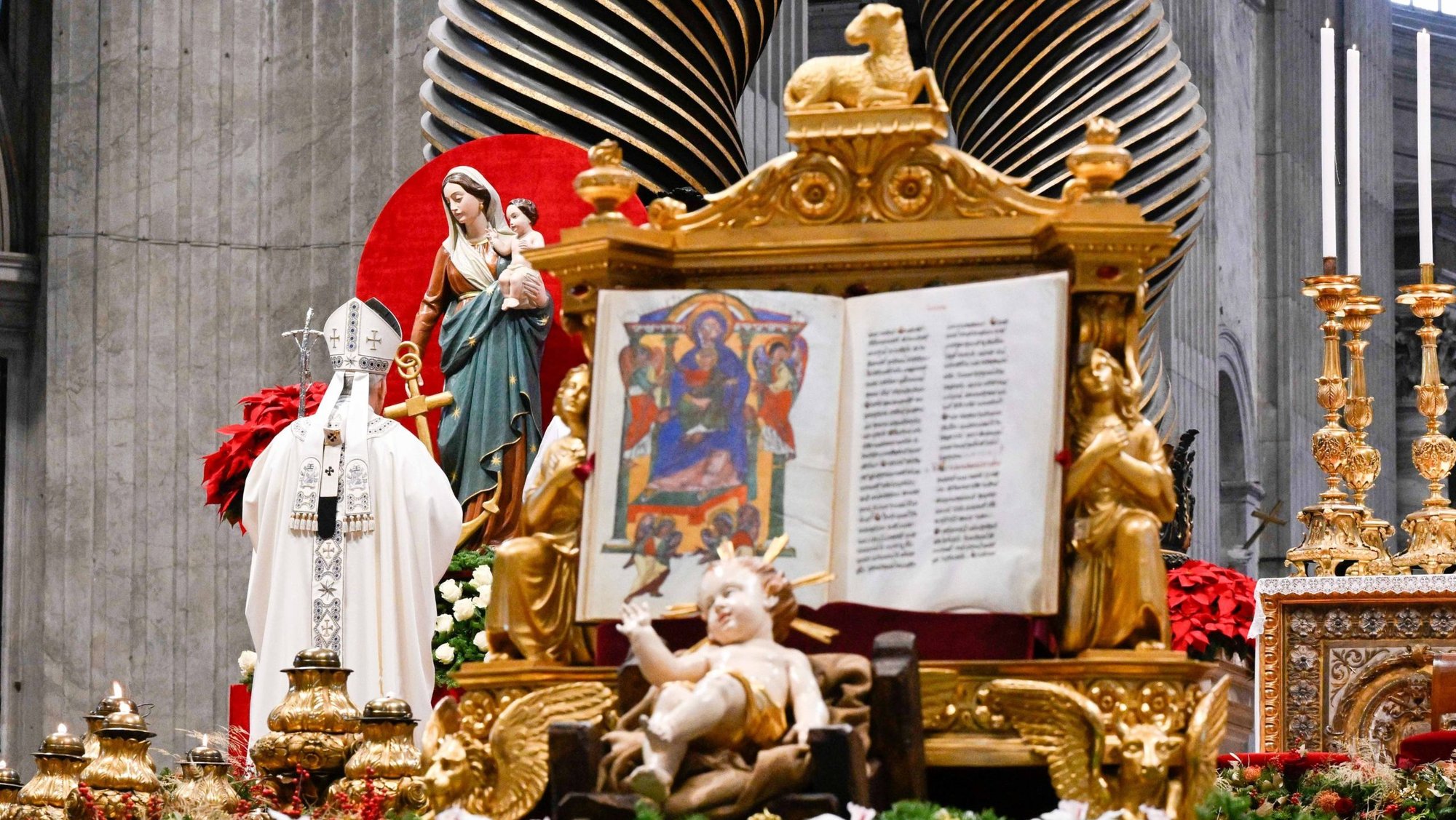 Pope Leo XIV prays before a statue of Our Lady of Hope and the Christ child during Mass for the feast of Mary, Mother of God, and World Peace Day in St. Peter’s Basilica at the Vatican Jan. 1, 2026. (CNS photo/Vatican Media)