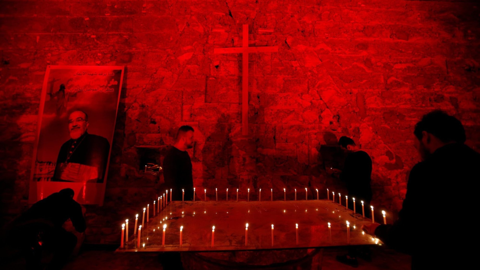 A file photo shows the Chaldean Church of St. Paul in Mosul, Iraq, illuminated with red light in protest against the persecution of Christians around the world. (OSV News photo/Khalid Al-Mousily, Reuters)