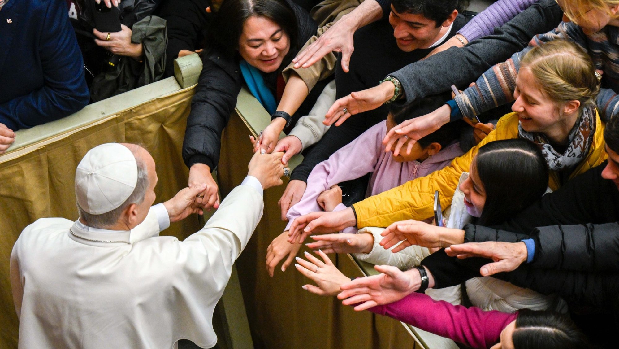 Pope Leo XIV greets people at the conclusion of his weekly general audience in the Paul VI Audience Hall at the Vatican Feb. 4, 2026. (CNS photo/Vatican Media)