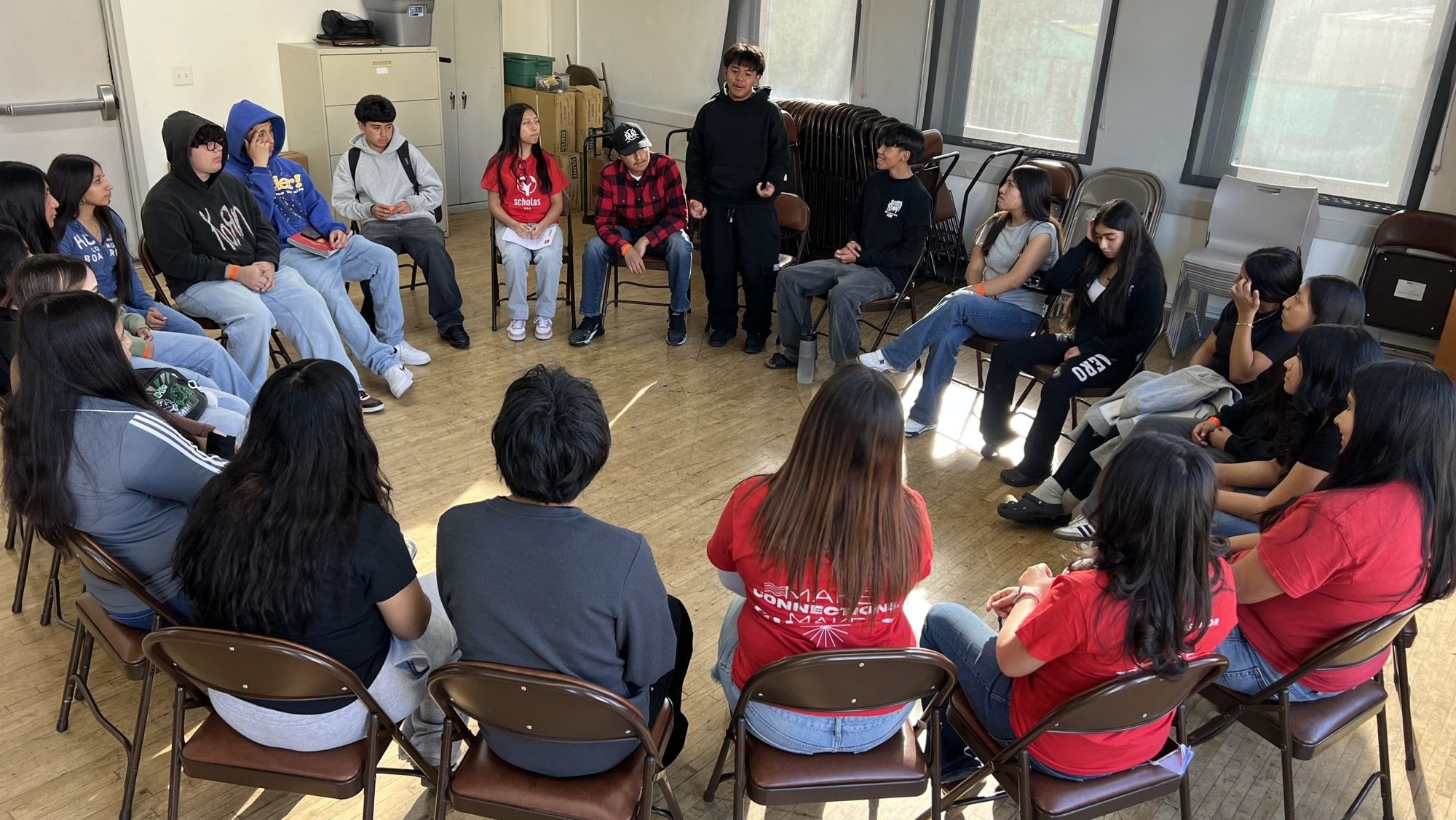 Young people communicate in a circle as part of the “Teens in Motion” event on March 7 at St. Thomas the Apostle School in Los Angeles, put on by the LA chapter of Scholas USA. (Scholas USA)