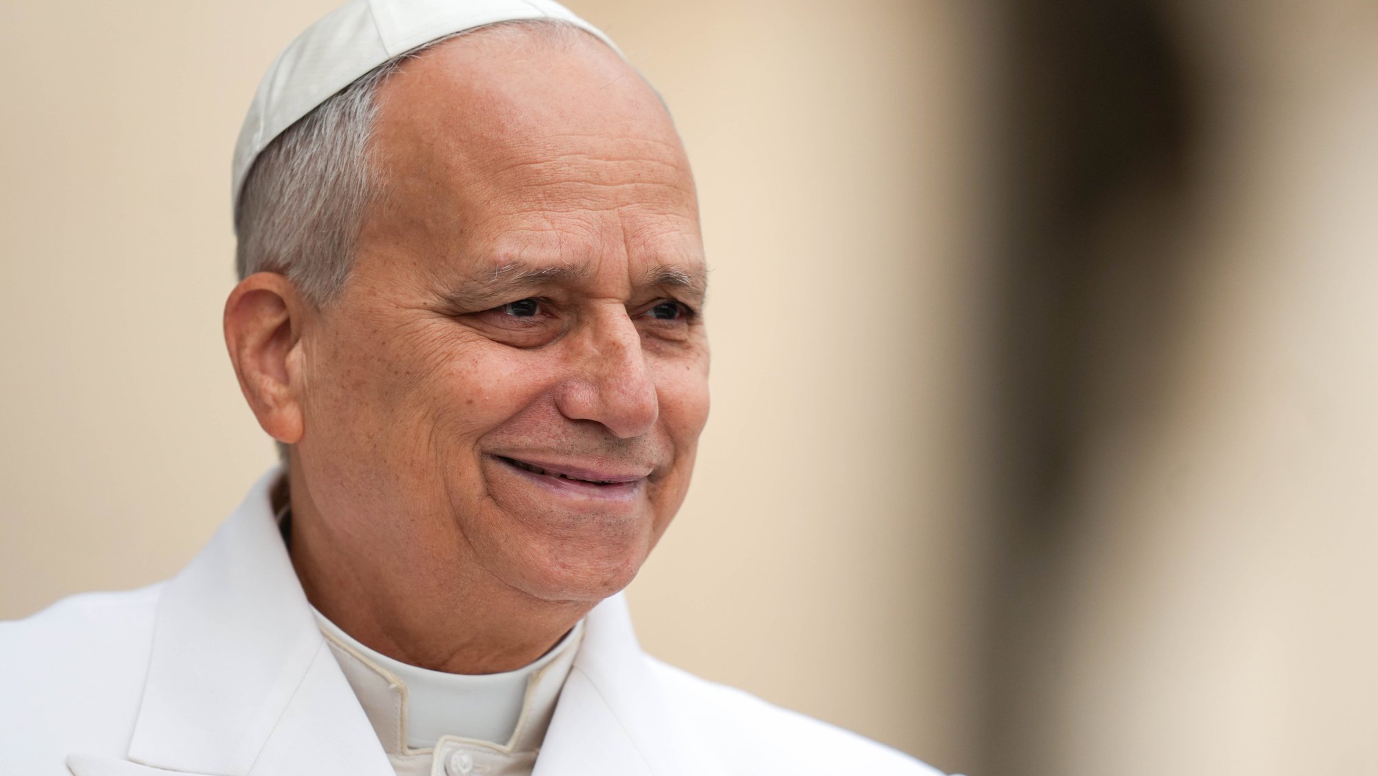 Pope Leo XIV smiles as he greets visitors and pilgrims from the popemobile while riding around St. Peter’s Square at the Vatican before his weekly general audience April 1, 2026. (CNS photo/Lola Gomez)