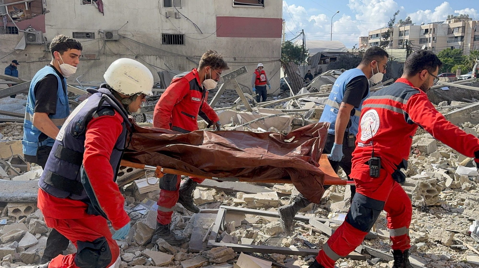 Emergency responders work at the site of an Israeli airstrike in Sidon, Lebanon, April 8, 2026. As the ceasefire between the United States and Iran risked collapsing due to disagreements, Israel pressed on with its attack on alleged Hezbollah targets in Lebanon, killing at least 254 people and wounding hundreds more. (OSV News photo/Ali Hankir, Reuters)