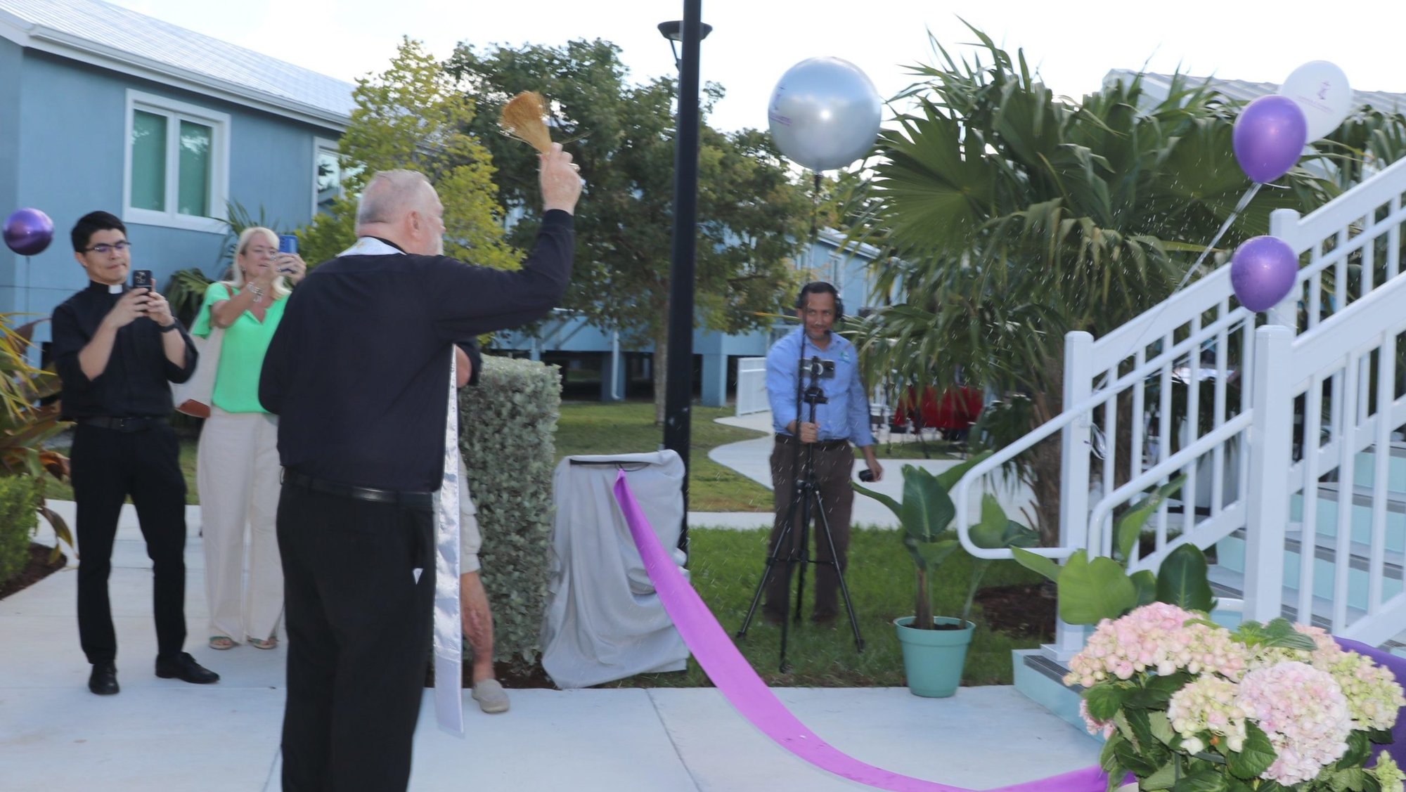Miami Archbishop Thomas G. Wenski blesses Catholic Charities' new 10-unit apartment building for people with disabilities at St. Bede's Village in Key West on March 14, 2025. The ceremony was attended by representatives from Catholic Charities, the city of Key West and Monroe County, along with various local leaders.The affordable housing project is in Monroe County. (OSV News photo/Rocío Granados, La Voz Católica, Florida Catholic)