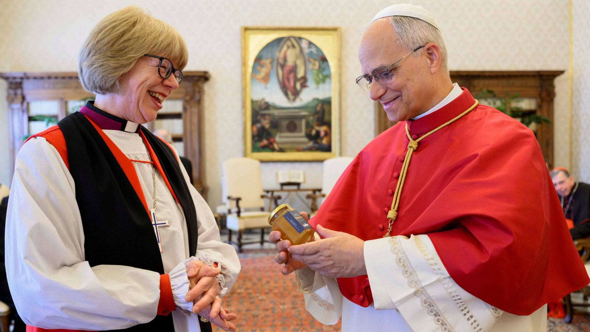 Pope Leo XIV receives a gift from Anglican Archbishop Sarah Mullally of Canterbury during their meeting at the Vatican April 27, 2026. (OSV News photo/Simone Risoluti, Vatican Media)