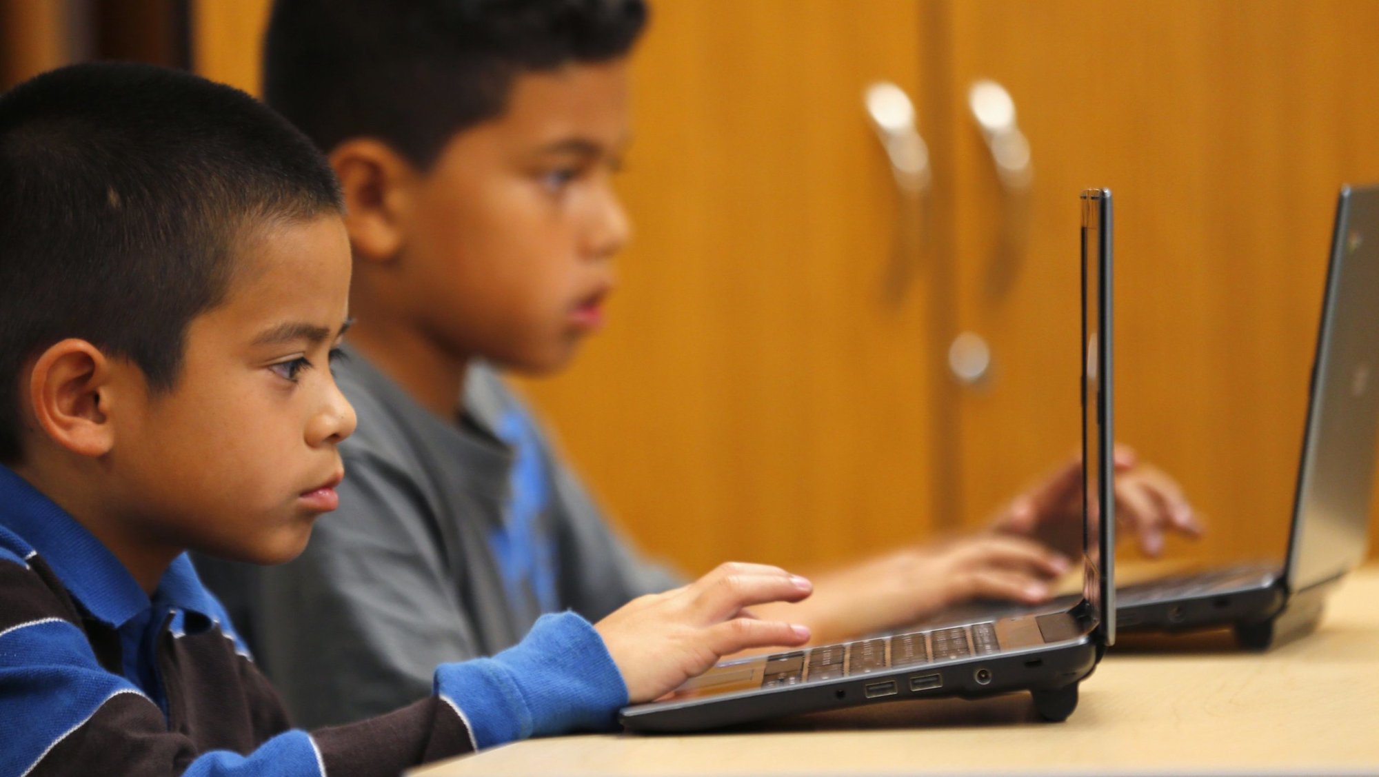 Fourth-grade students are pictured in a file photo working on laptop computers at Monarch School in San Diego. (OSV News photo/Mike Blake, Reuters)
