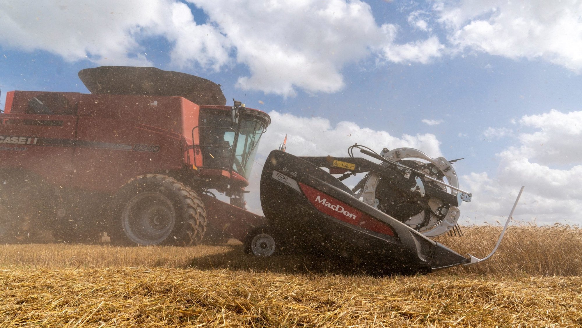 A combine harvests wheat in Kremlin, Okla., June 12, 2025. As the U.S. Senate prepares to considers a 2026 farm bill approved by the U.S. House, Catholic organizations sought to stress to lawmakers the importance of efforts to combat hunger, such as robust support for the Supplemental Nutrition Assistance Program, or SNAP, a major part of the nation’s social safety net. (OSV News photo/Nick Oxford, Reuters)