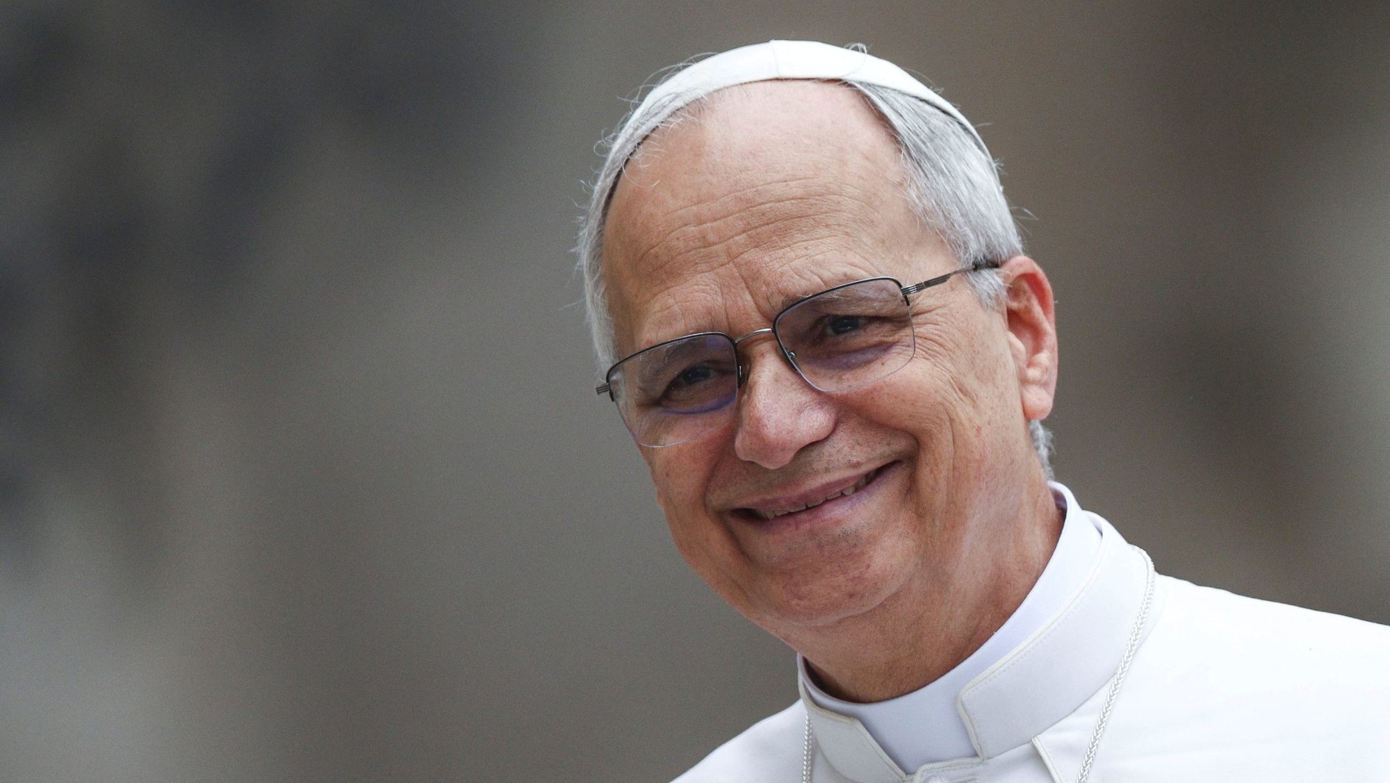 Pope Leo XIV smiles as he arrives for his first weekly general audience in St. Peter's Square at the Vatican May 21, 2025. (CNS photo/Guglielmo Mangiapane, Reuters)