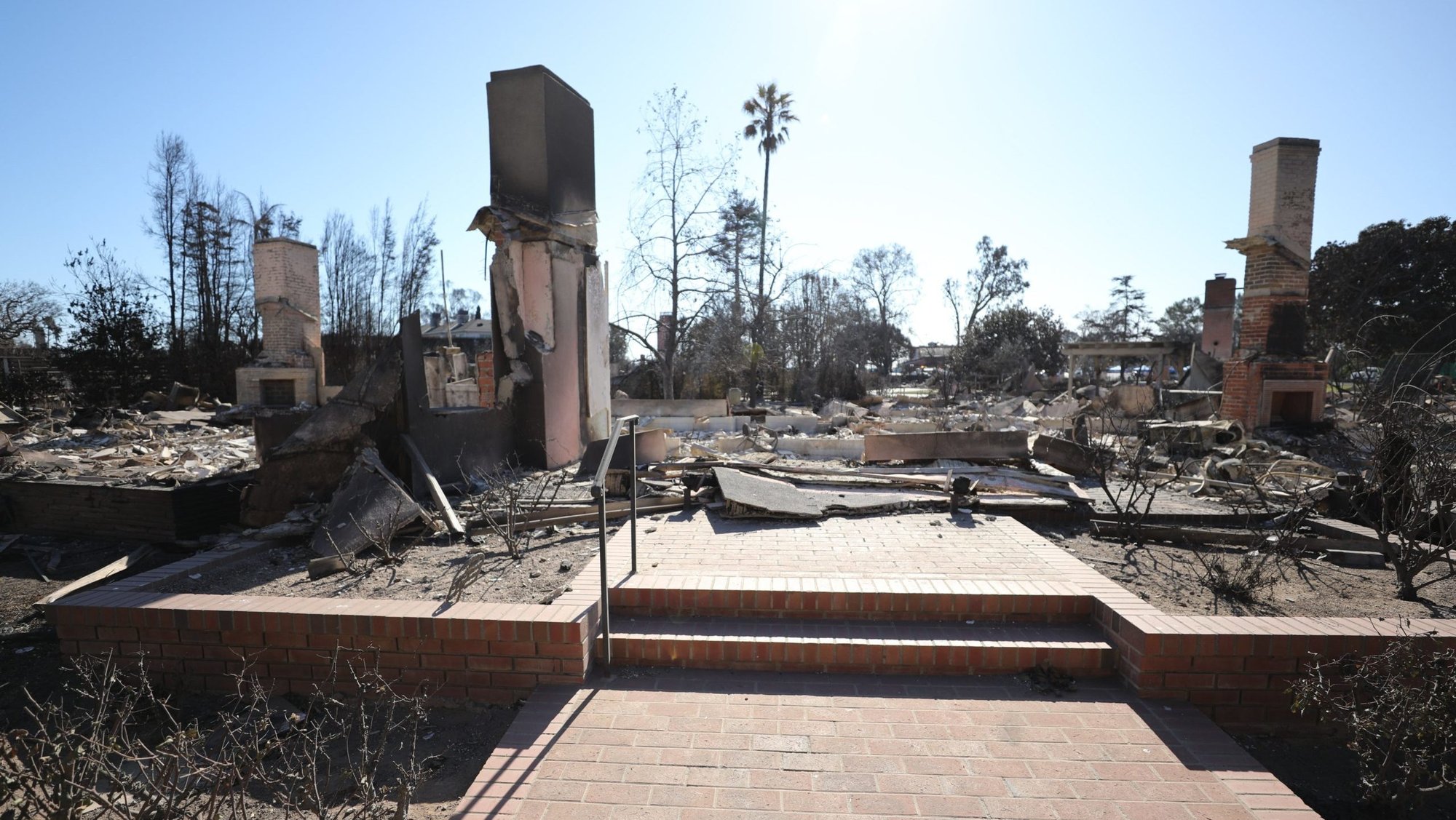 The remains of the residence of Msgr. Liam Kidney, pastor of Corpus Christi Church, is seen in Pacific Palisades on the west side of Los Angeles Jan. 15, 2025, in the aftermath of the wildfires. The church was a total loss, and a section of the school was destroyed. (OSV News/Bob Roller)