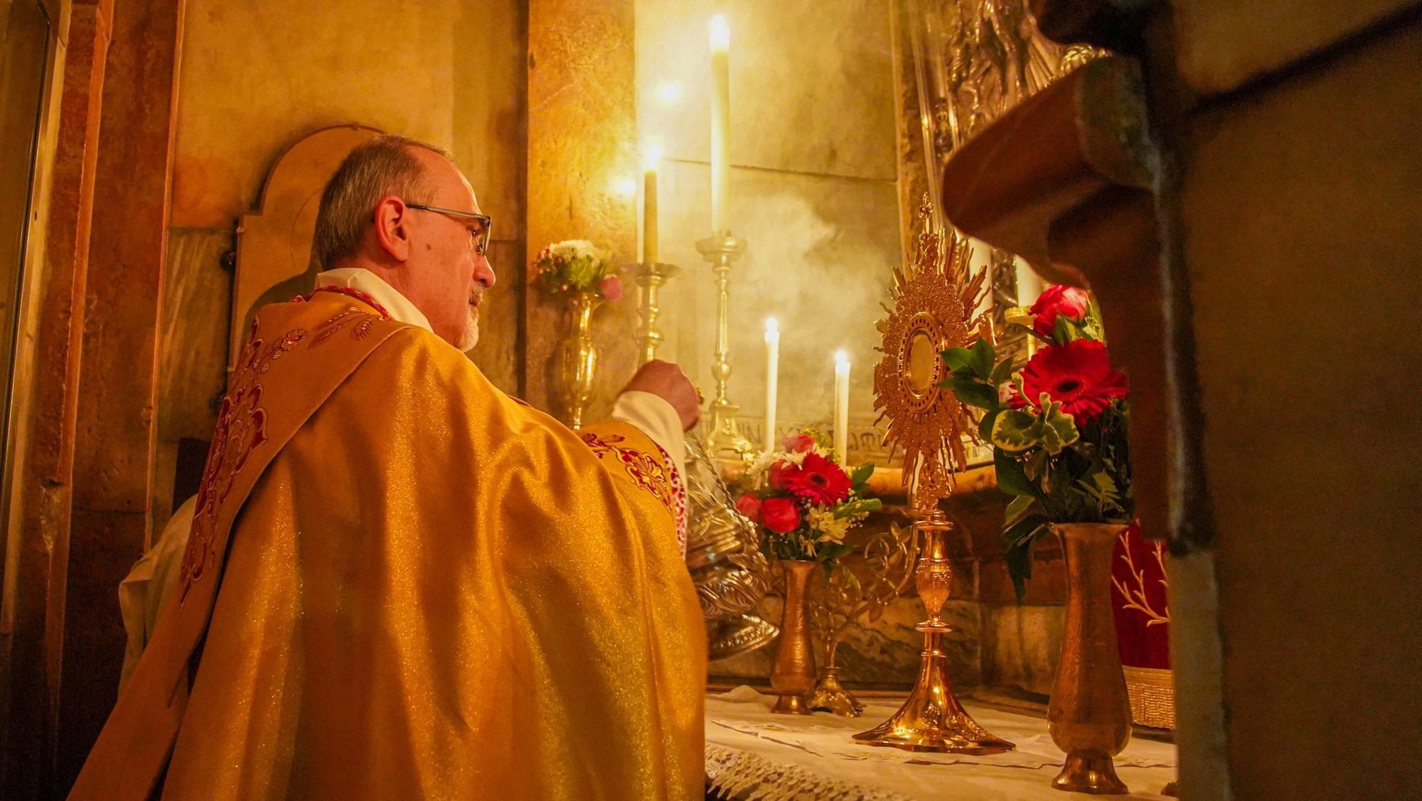 Cardinal Pierbattista Pizzaballa swings a censer over the altar June 4, 2026, in the the tomb where Christ's body laid after his crucifixion and before the resurrection, in the Church of the Holy Sepulcher in Jerusalem, after celebrating Mass and leading a Corpus Christi procession. (OSV News photo/courtesy Latin Patriarchate of Jerusalem)
