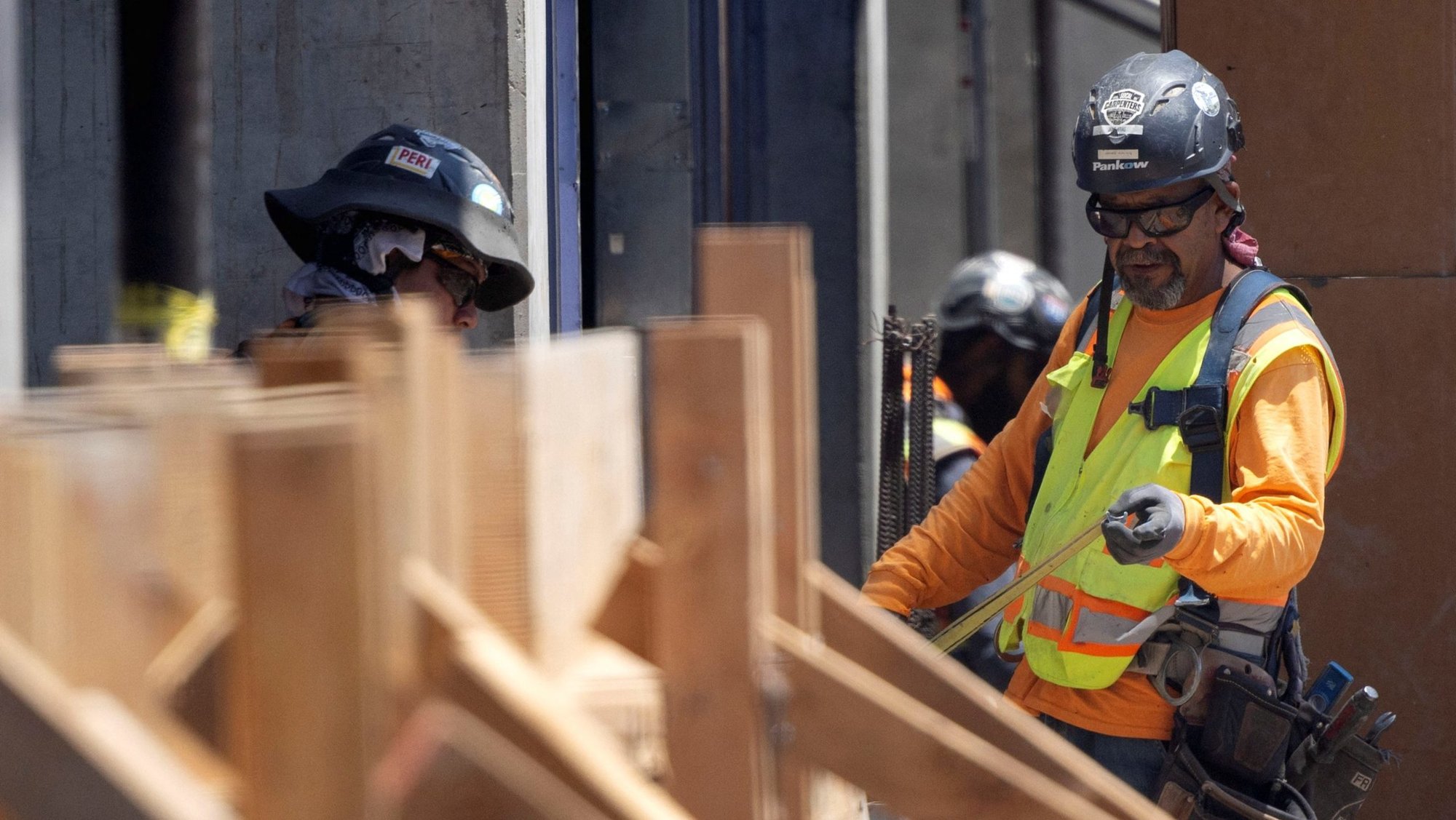Workers work under the sun on a construction site during hot weather in Los Angeles, California, U.S. July 5, 2024. The U.S. bishops conference is advocating Congress take concrete actions on the national affordable housing crisis, which experts say is having ramifications for marriage and family formation. (OSV News photo/Etienne Laurent, Reuters)