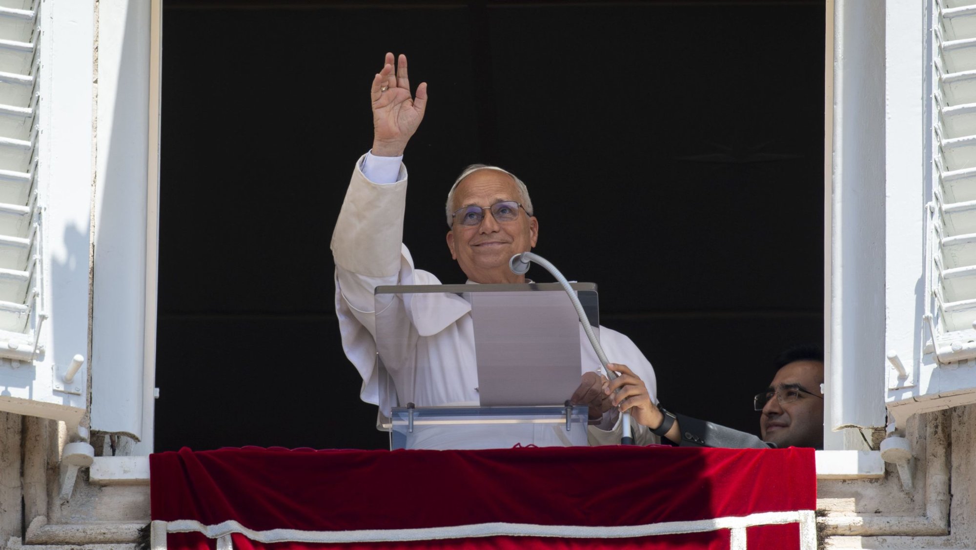 Pope Leo XIV waves to the crowd as he leads the Angelus in St. Peter's Square at the Vatican June 14, 2026. (OSV News photo/Matteo Pernaselci, Vatican Media)