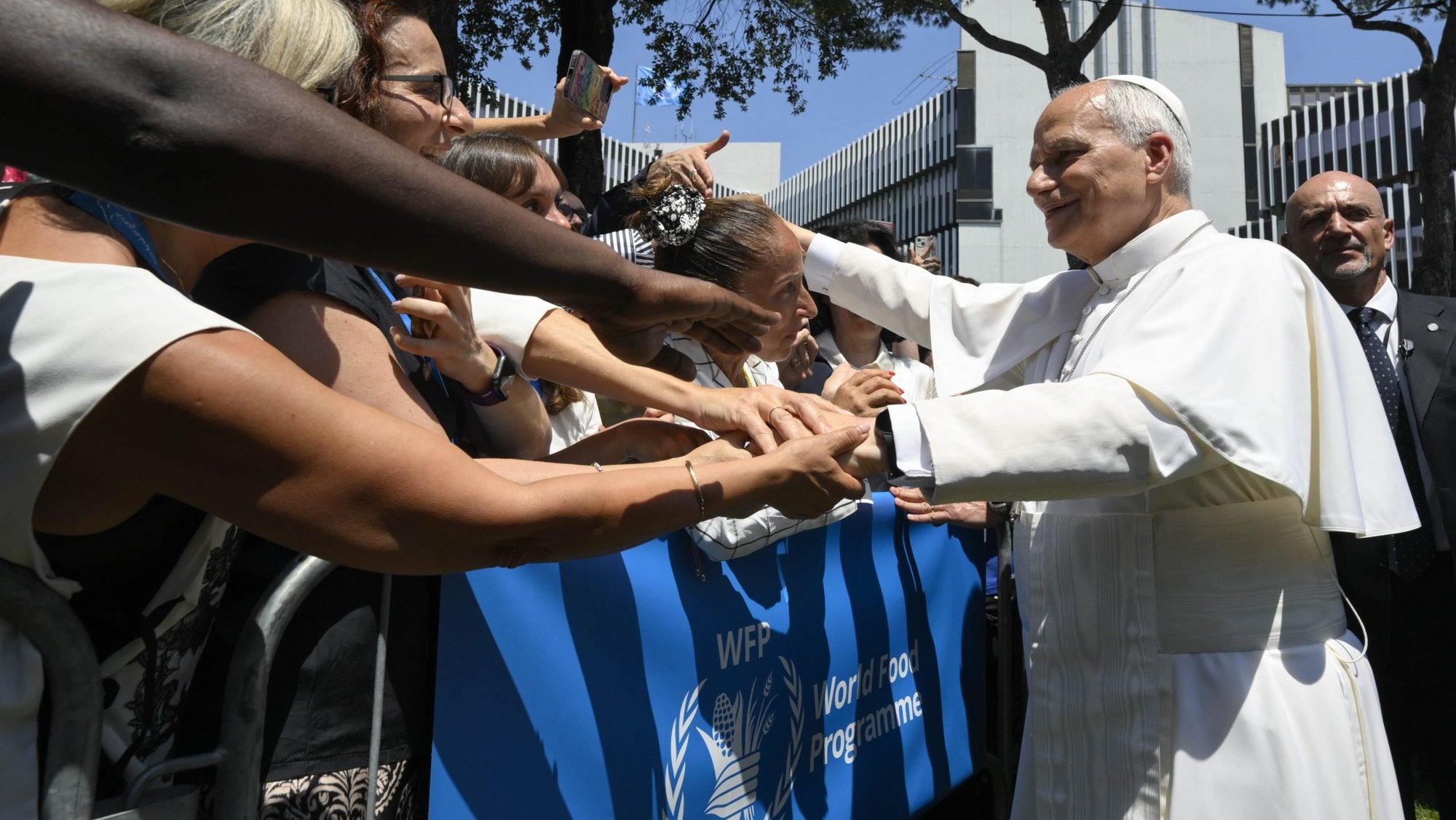 Pope Leo XIV greets employees of the United Nations' World Food Program outside its Rome headquarters June 22, 2026. (OSV News photo/Simone Risoluti, Vatican Media)