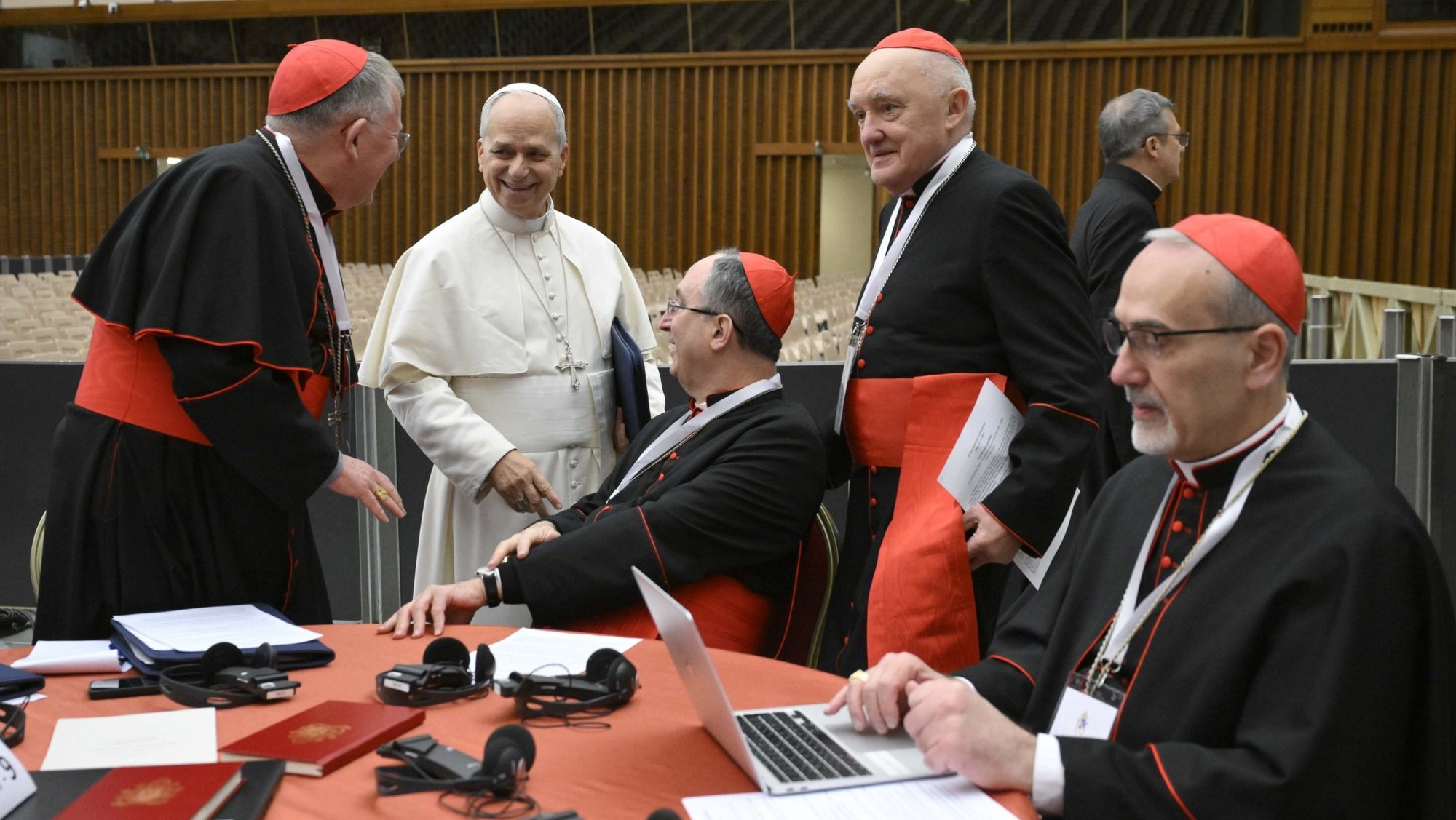 Pope Leo XIV shares a light moment with cardinals Jan. 8, 2026, during a consistory at the Vatican Jan. 7-8. In the foreground is Cardinal Pierbattista Pizzaballa, the Latin patriarch of Jerusalem. (OSV News photo/Simone Risoluti, Vatican Media)