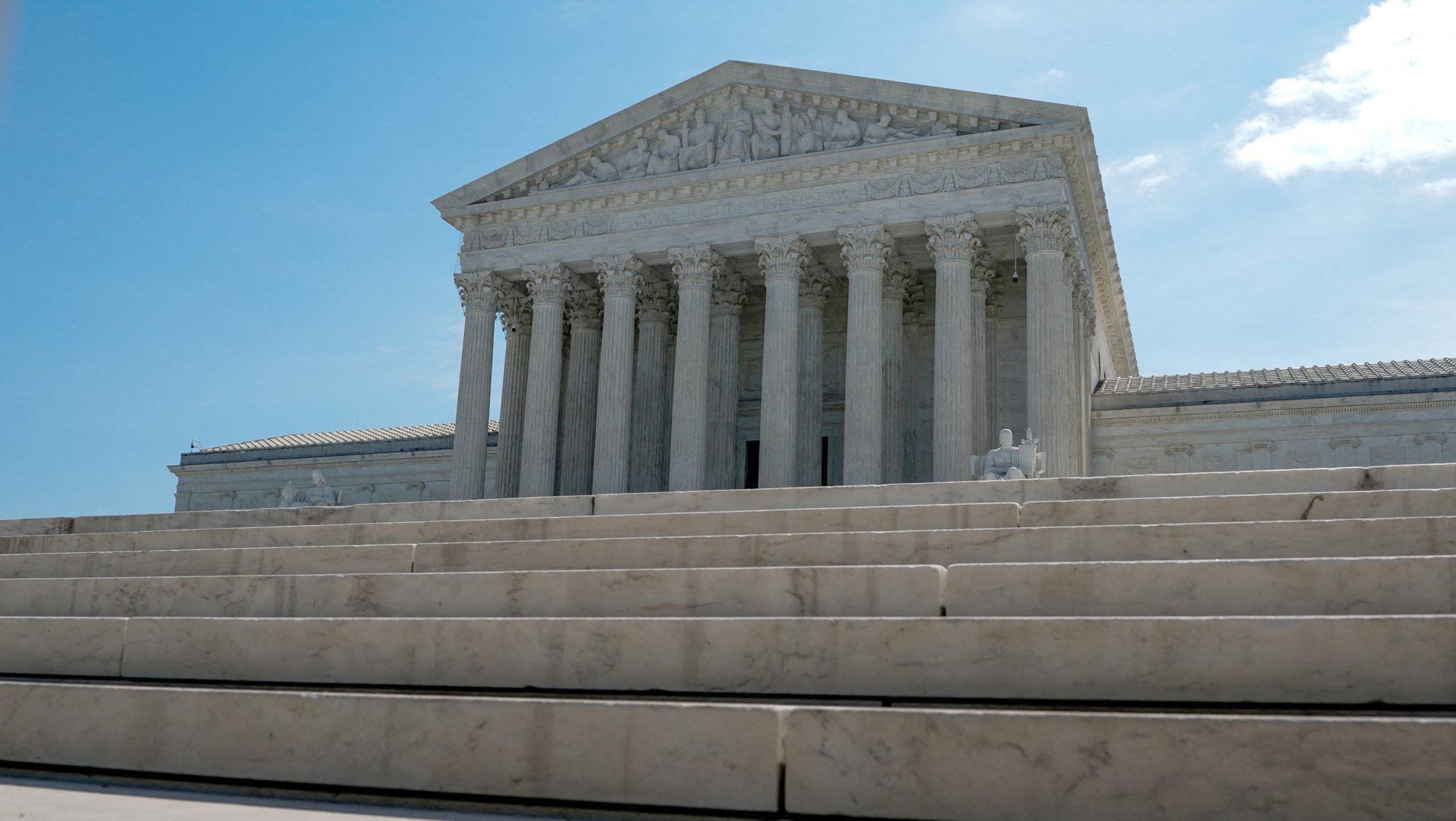 The U.S. Supreme Court is seen in Washington June 25, 2026, the day the court ruled that the Trump administration can end a program temporarily shielding eligible Haitian and Syrian immigrants living in the U.S. from deportation. In a second ruling handed down the same day, the court said the U.S. government can restrict asylum claims processing at the U.S. border. (OSV News photo/Elizabeth Frantz, Reuters)