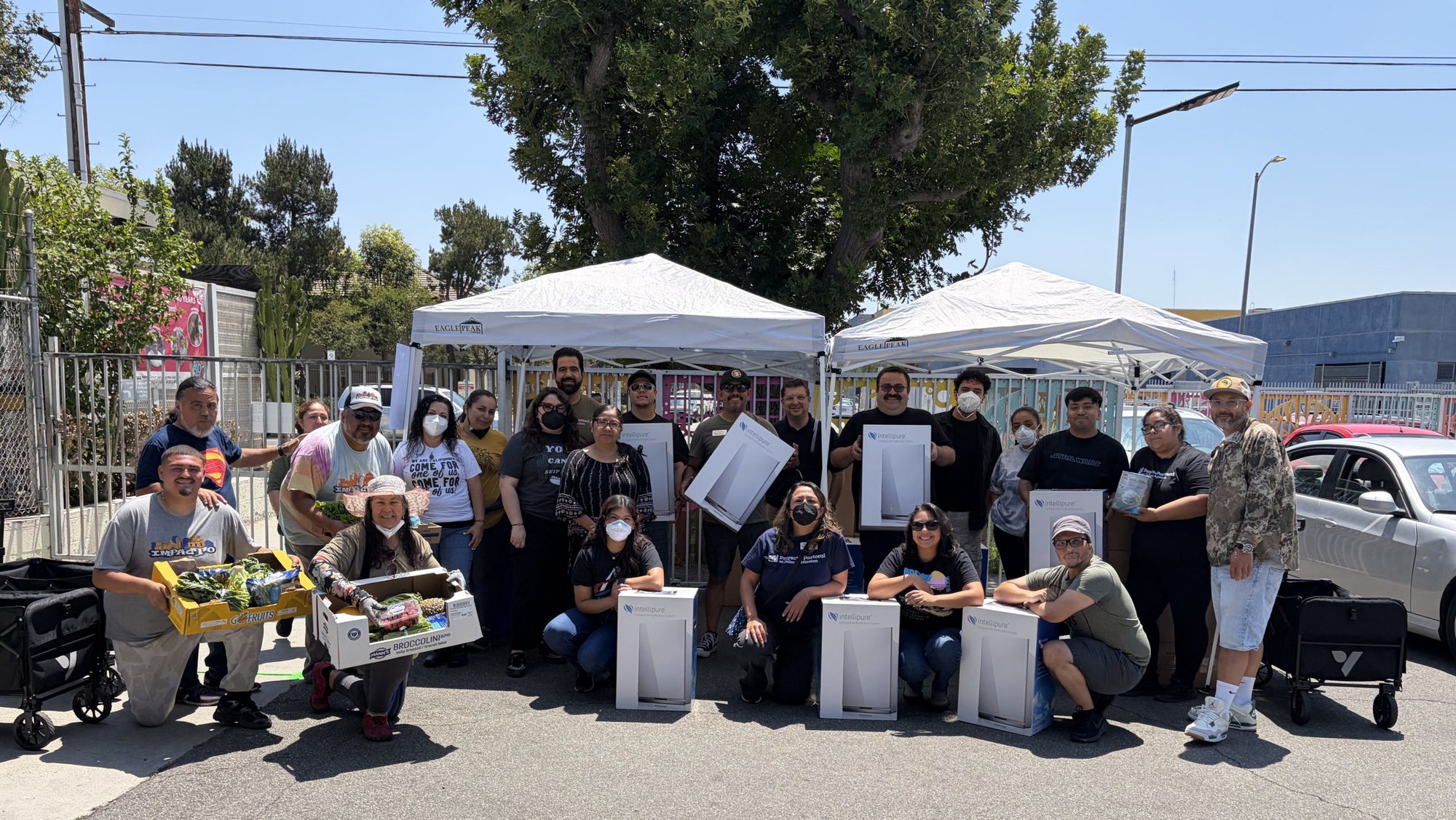 Helpers at Proyecto Pastoral at Dolores Mission prepare to distribute air purifiers, food, and more during the Boyle Heights warehouse fire. (Proyecto Pastoral)