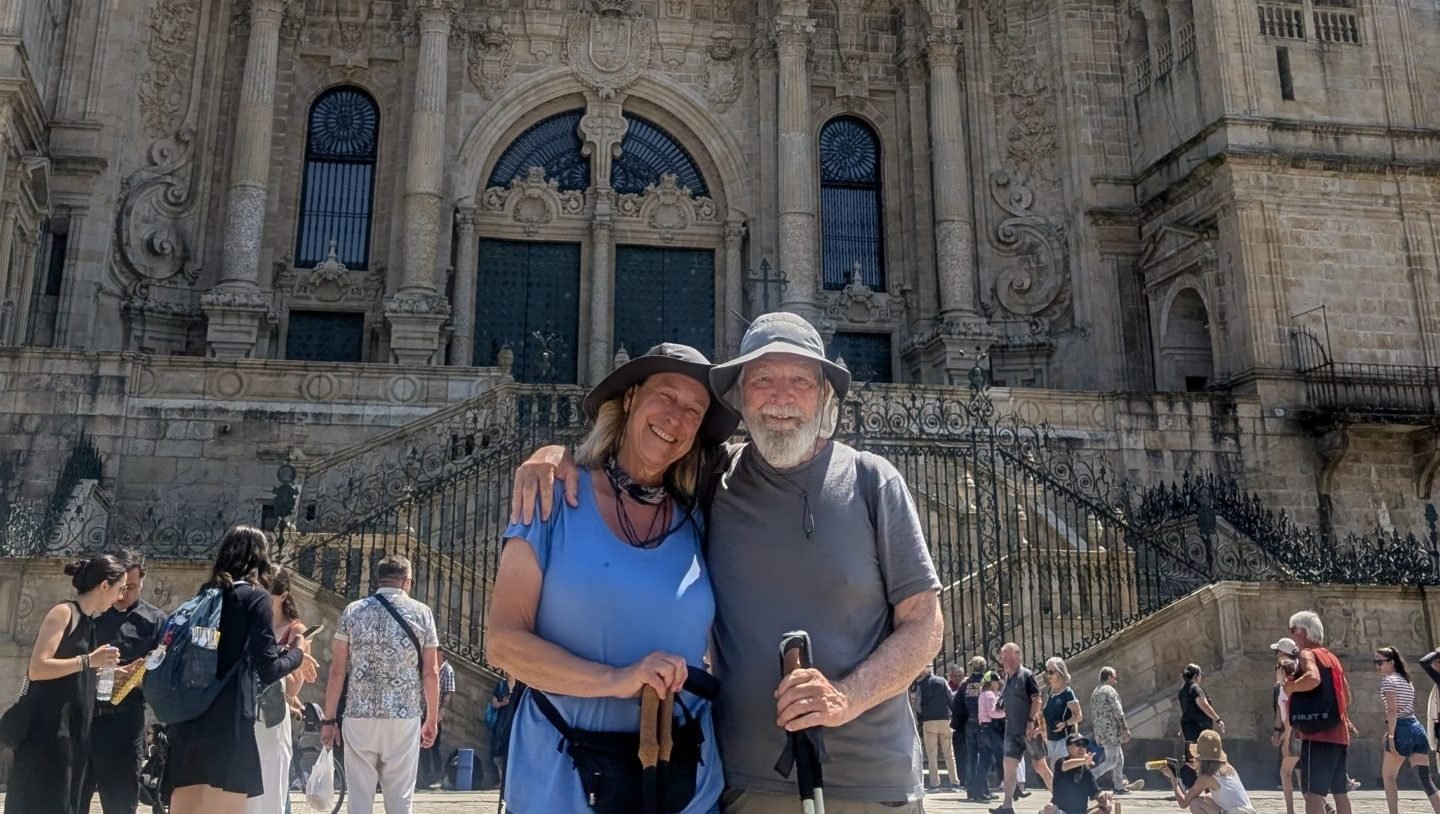 The author and her husband upon reaching the Cathedral of Santiago de Compostela in June of this year. According to tradition, the relics of St. James have been housed in the church for centuries. (Mary Agnes Erlandson Cerny)