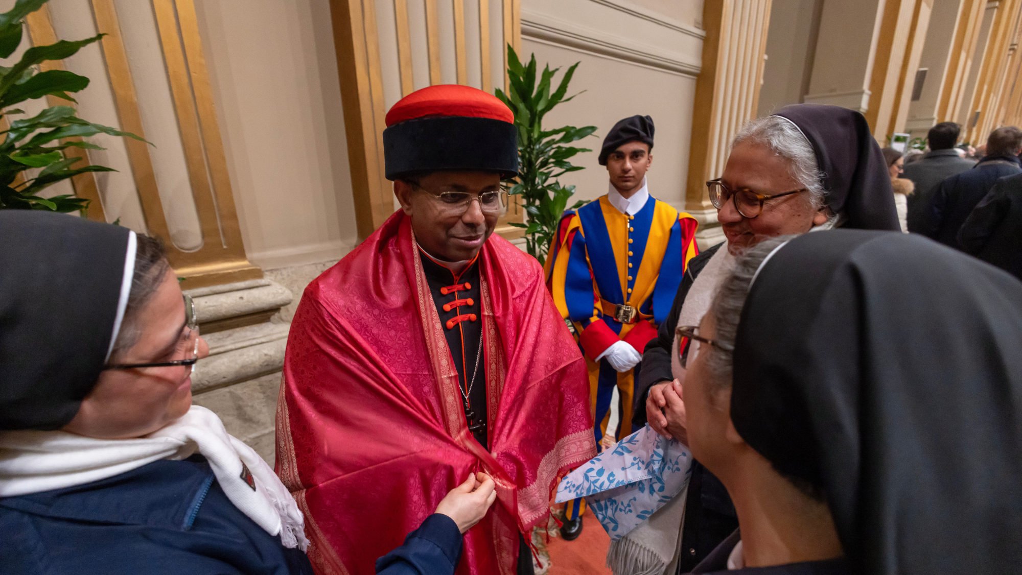 Cardinal George J. Koovakad, prefect of the Dicastery for Interreligious Dialogue, greets visitors in the Apostolic Palace at the Vatican Dec. 7, 2024. (CNS/Pablo Esparza)