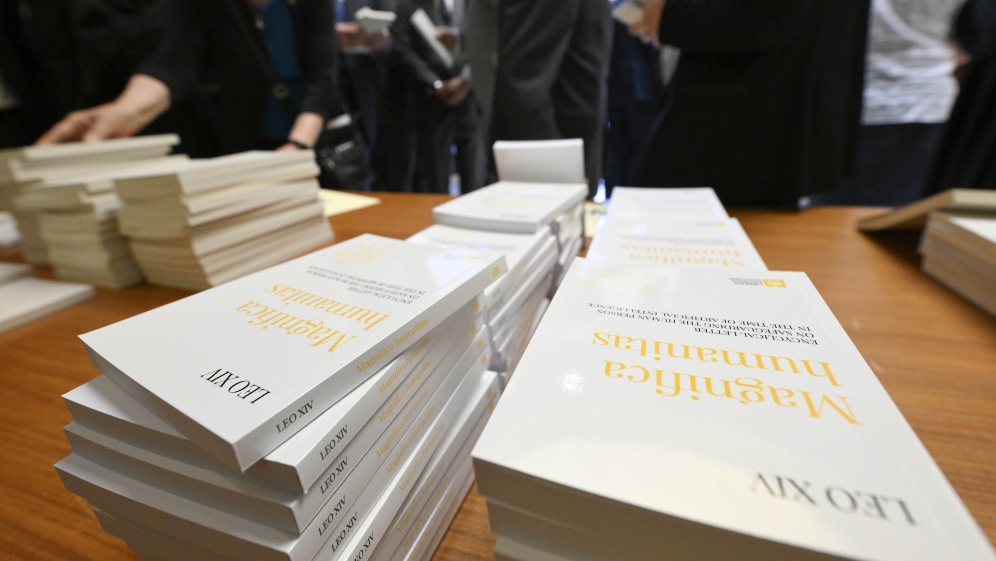 Copies of "Magnifica Humanitas" are seen at the Vatican's Synod Hall May 25, 2026. It is the first encyclical of Pope Leo XIV's papacy and focuses on the rise of artificial intelligence. (OSV News photo/Simone Risoluti, Vatican Media)
