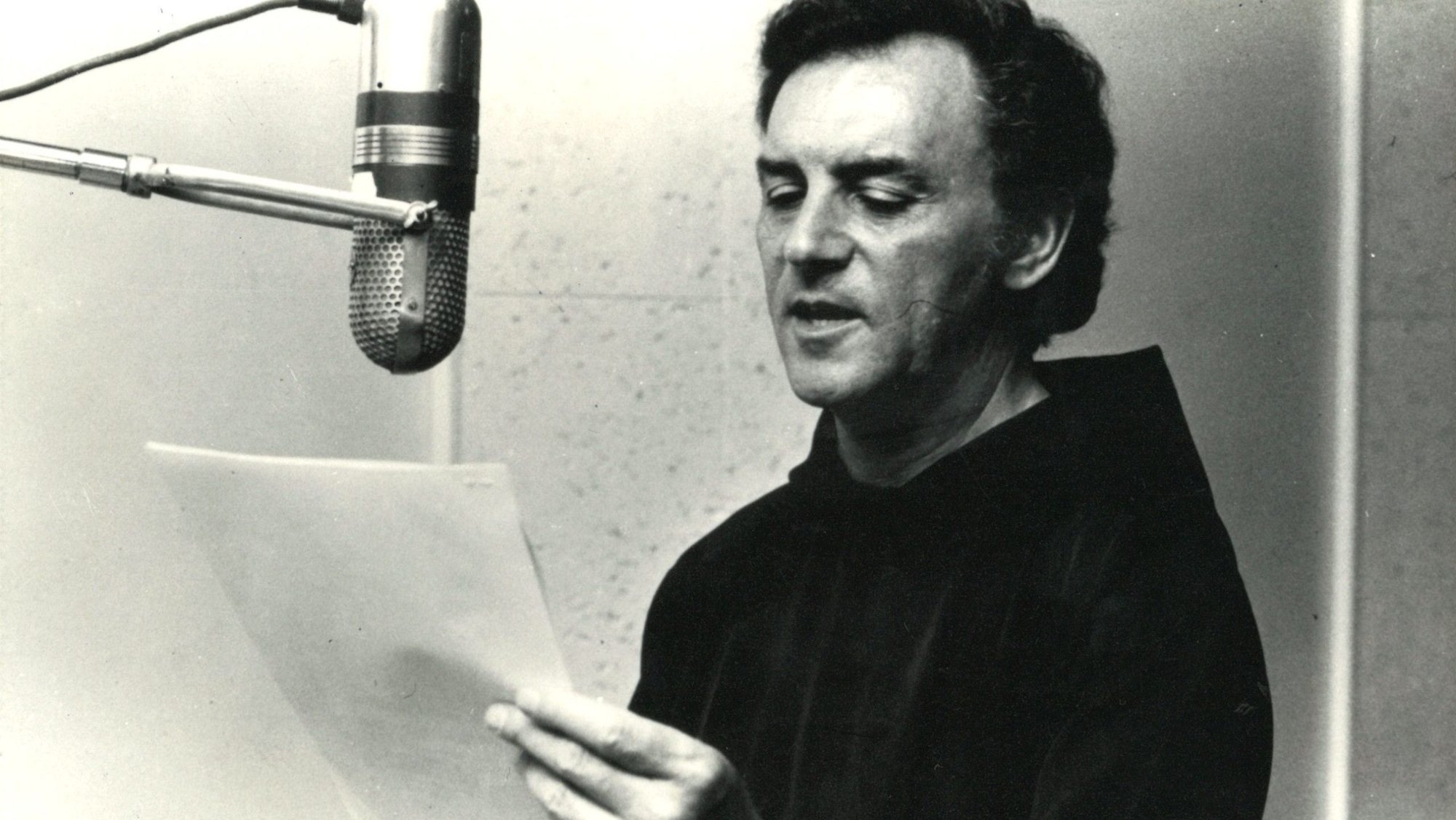 Father Tony Scannell records narration for a film project during his time as president of Franciscan Communications during the 1970s. (Tidings Archives)