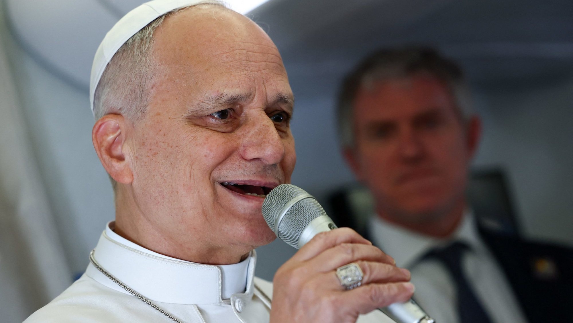 Pope Leo XIV speaks to members of the media aboard the papal plane April 15, 2026, en route to Yaounde, Cameroon, amid his apostolic journey. The Vatican announced Aug. 5 that Pope Leo will visit 10 cities in South America during his apostolic journey to Uruguay, Argentina and Peru Nov. 6-17. (OSV News photo/Guglielmo Mangiapane/Pool)