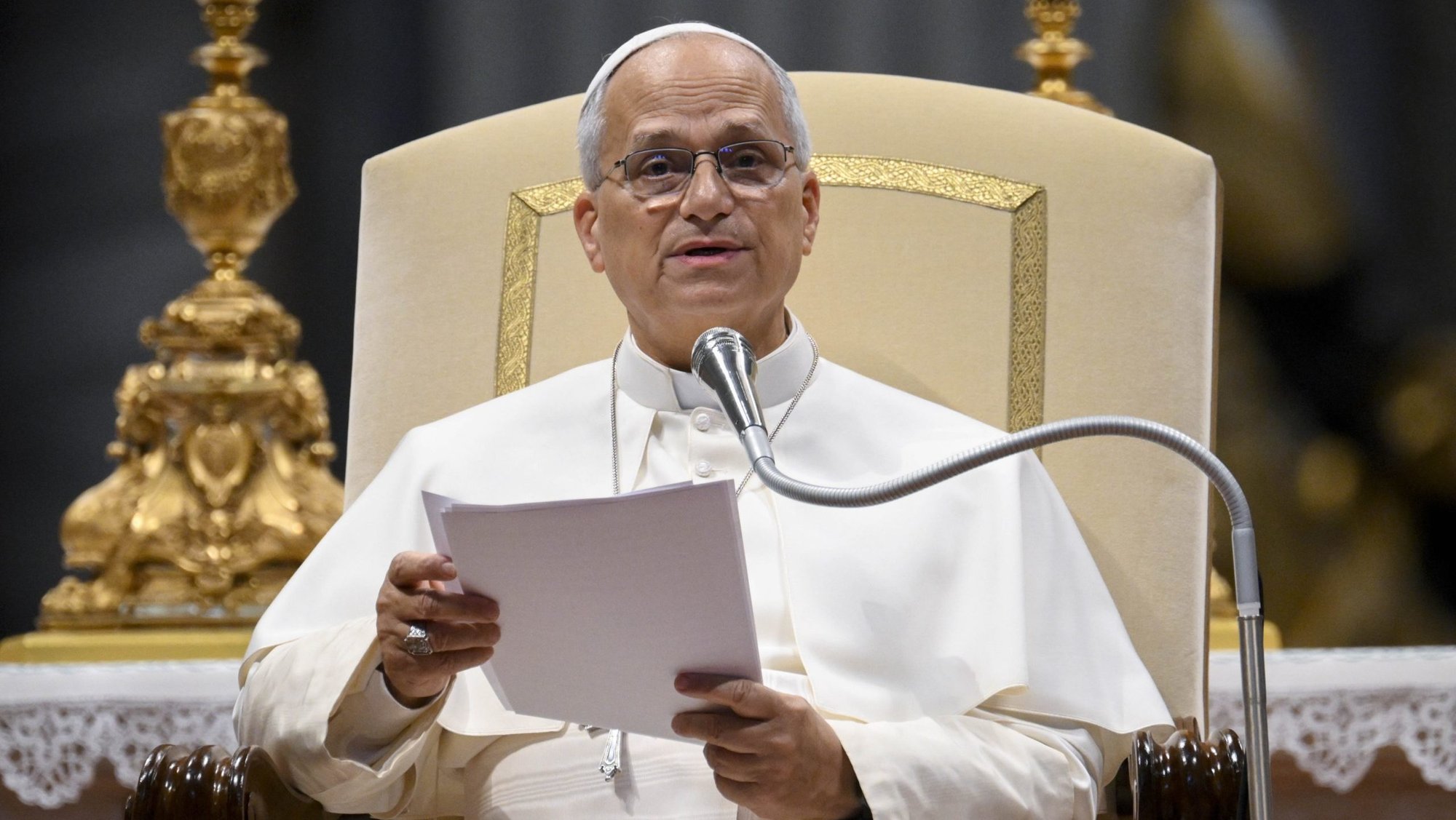 Pope Leo XIV talks to visitors and pilgrims during his weekly general audience in St. Peter's Basilica at the Vatican Aug. 12, 2026.(CNS photo/Vatican Media)