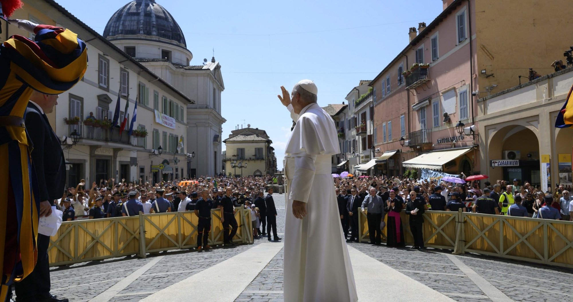 Pope Leo XIV greets people around noon in Piazza della Liberta in Castel Gandolfo near Rome Aug. 16, 2026. After leading the Angelus prayer, the pope decried the violence in the West Bank and called on the international community to "work toward advancing the two-state solution." (OSV News photo/Simone Risoluti, Vatican Media)